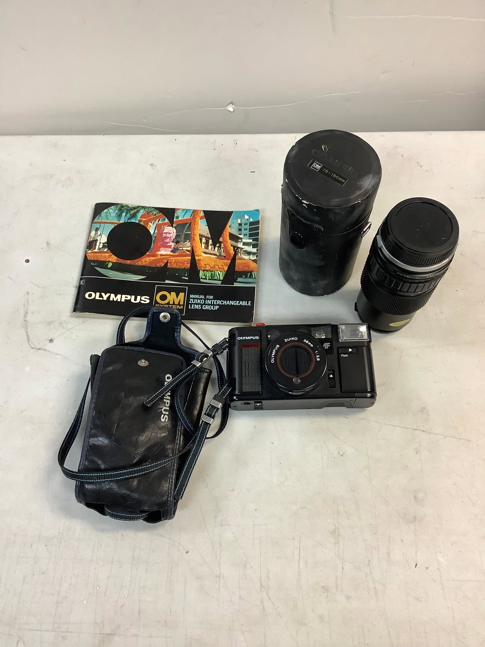 Olympus camera and lenses with case (1 of 1)