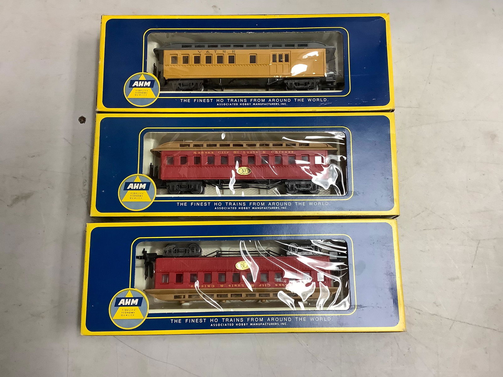three AHM old-time train cars: three AHM old-time train cars