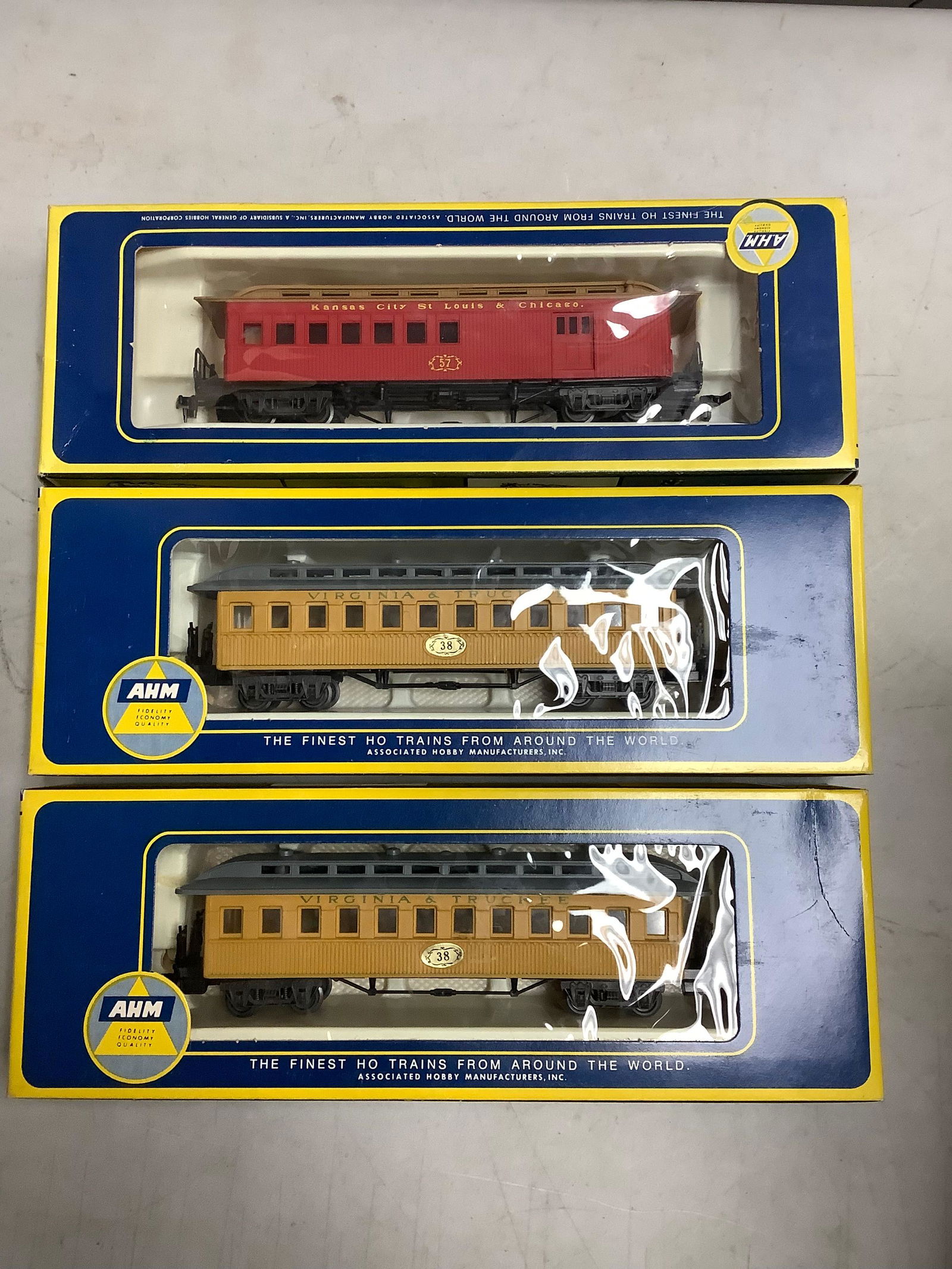 three AHM old-time train cars: three AHM old-time train cars