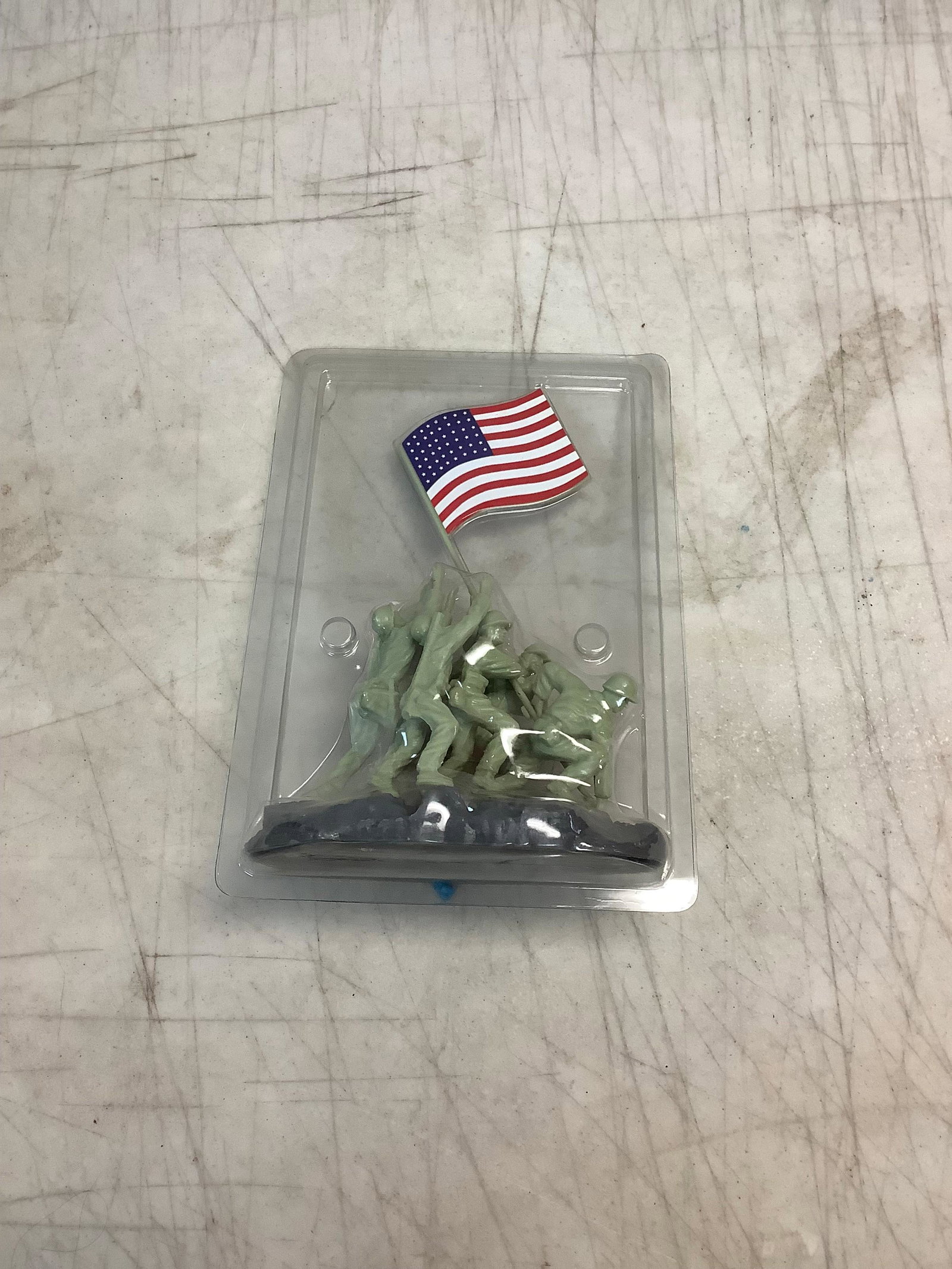 American soldiers holding up flag: American soldiers holding up flag