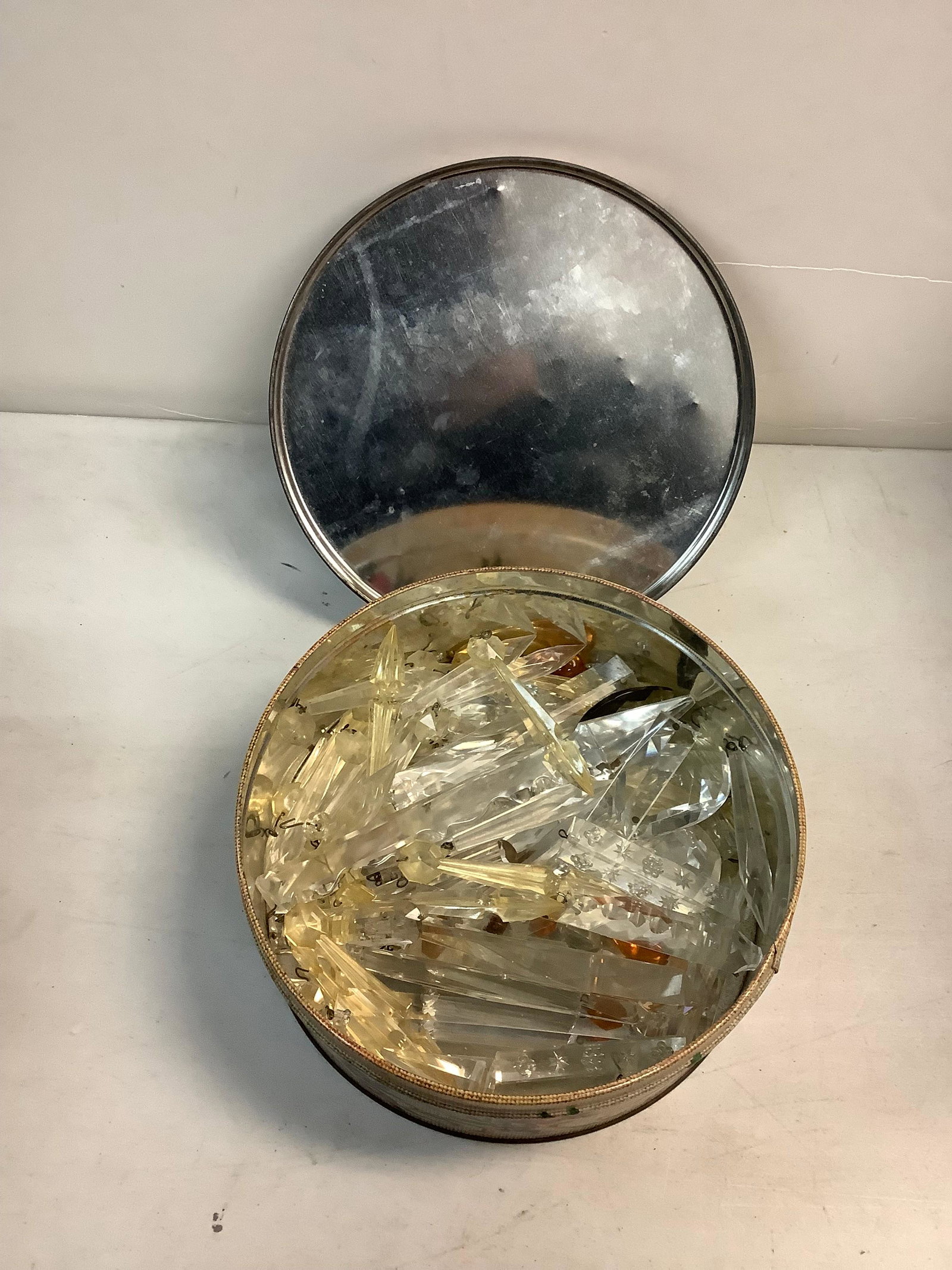 old tin with lamp crystals: old tin with lamp crystals