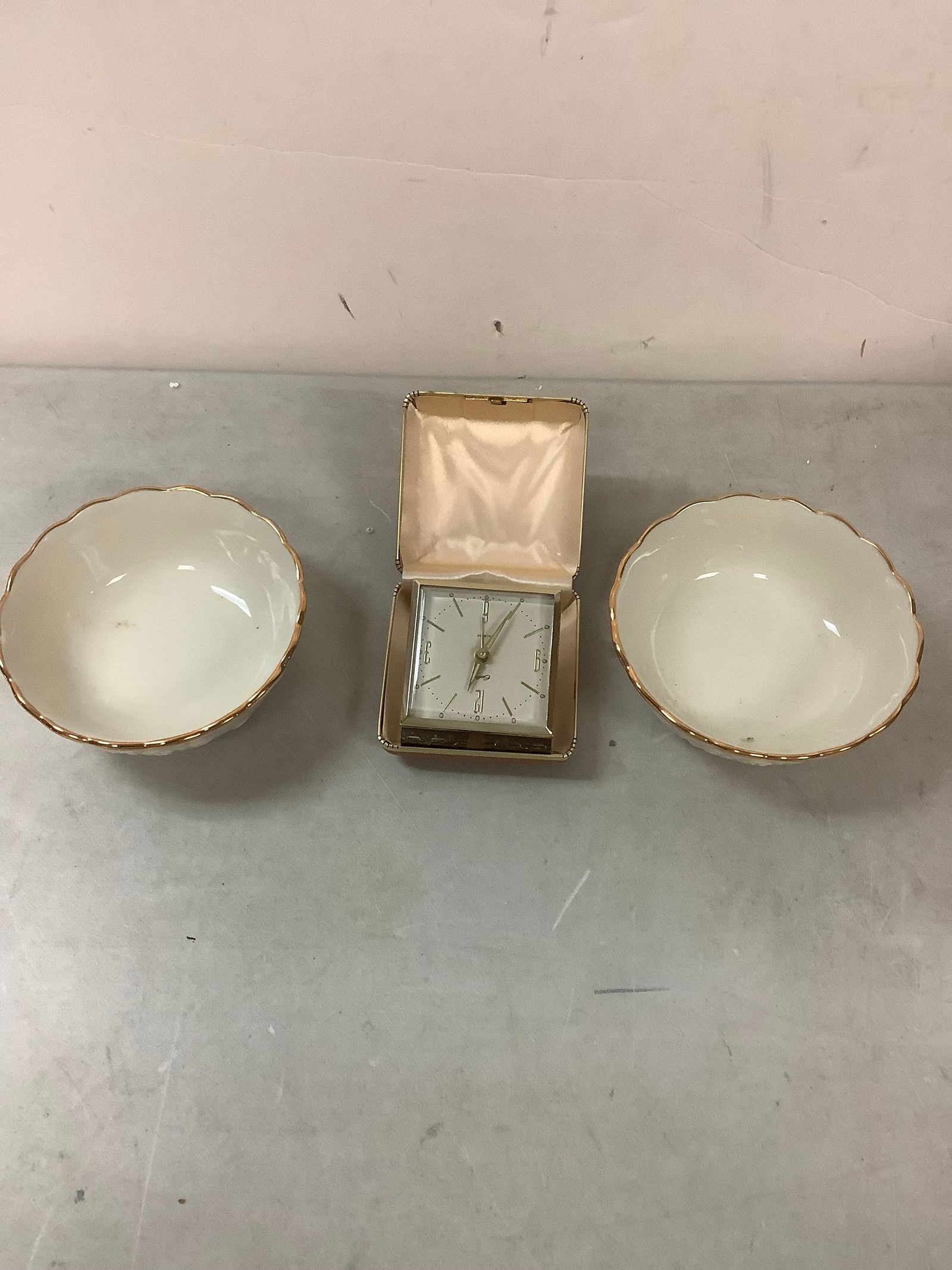 Lot of small white bowls and miniature clock (1 of 1)