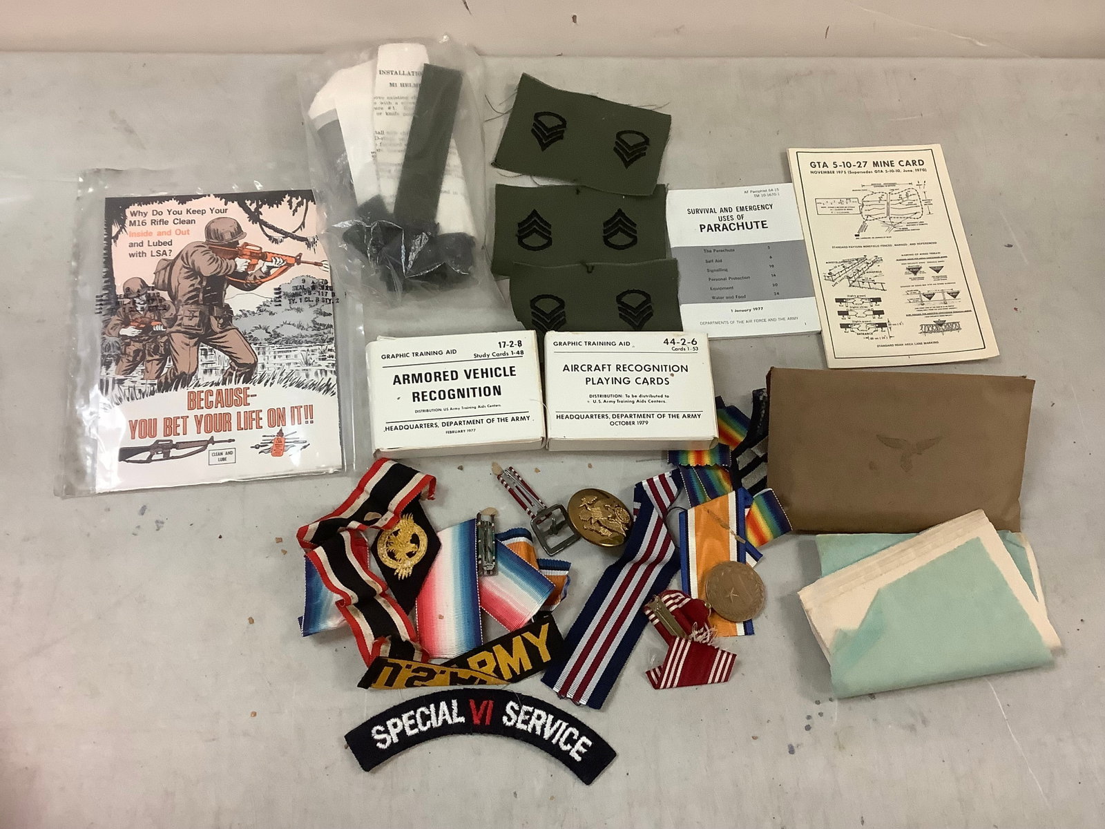 Lot of medals, training playing cards, and more: Lot of medals, training playing cards, and more