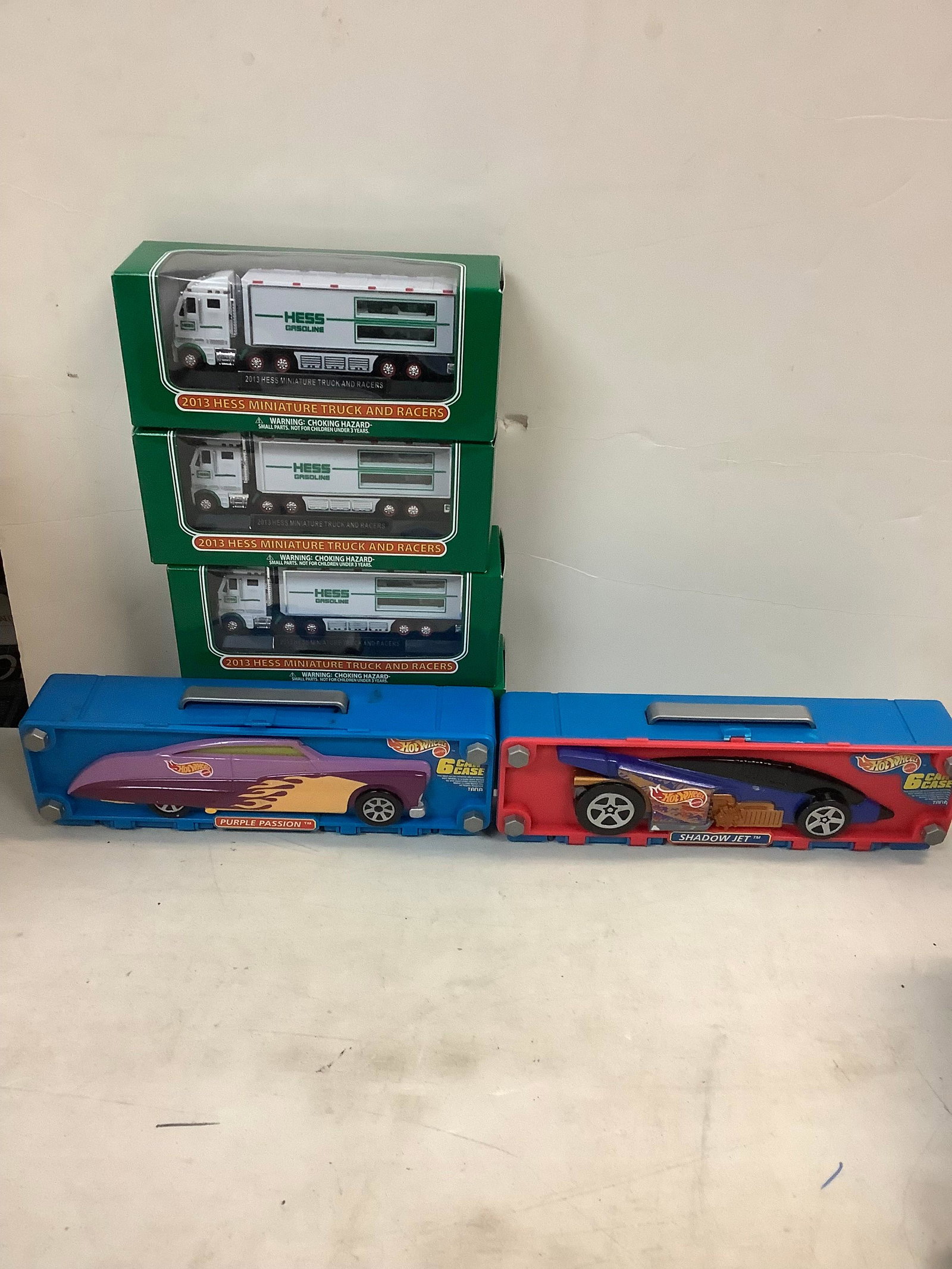 Hess trucks and hot wheel cars: Hess trucks and hot wheel cars
