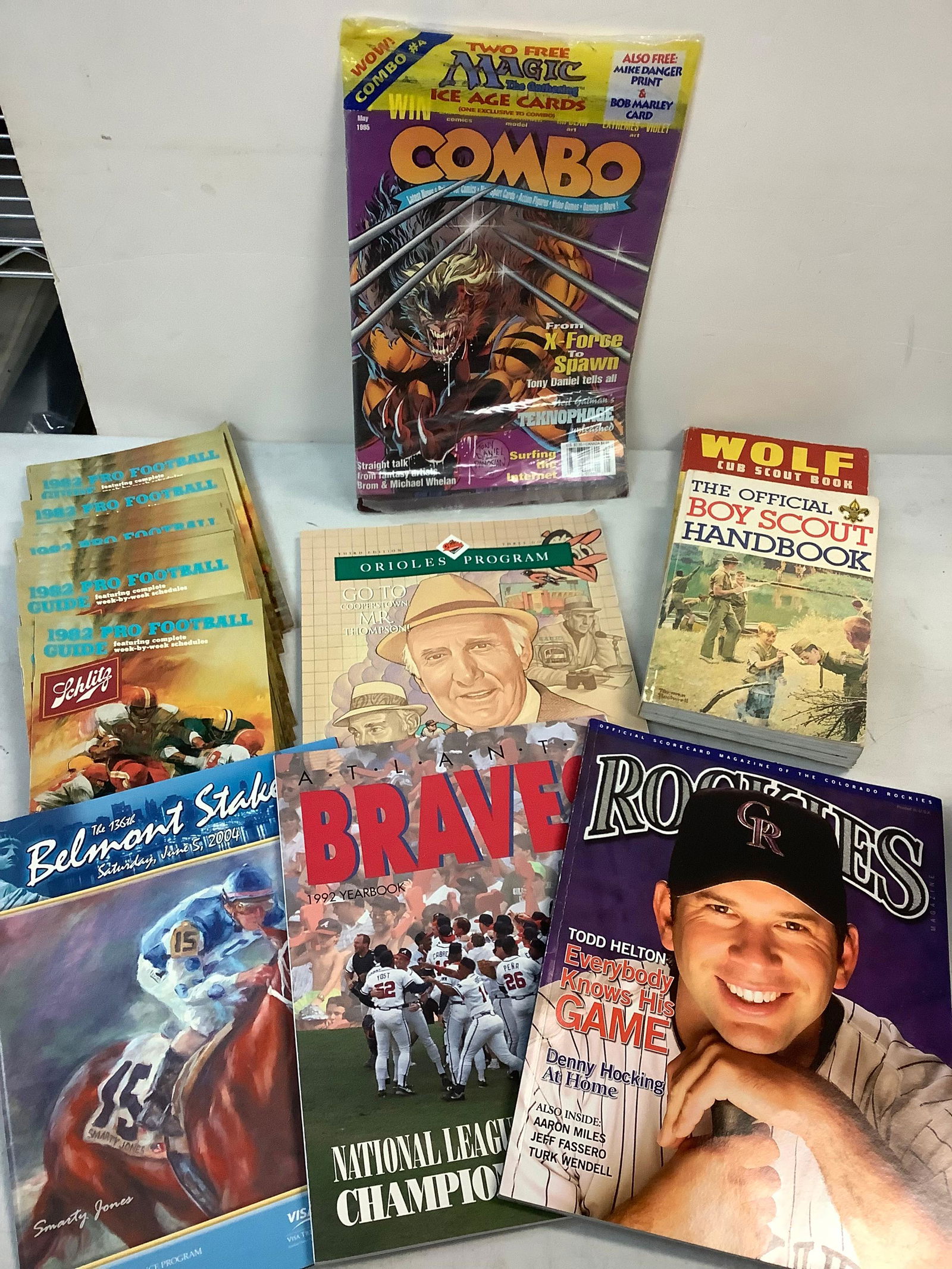 Lot of books, 1980s pro football guides, comic book and more (1 of 1)