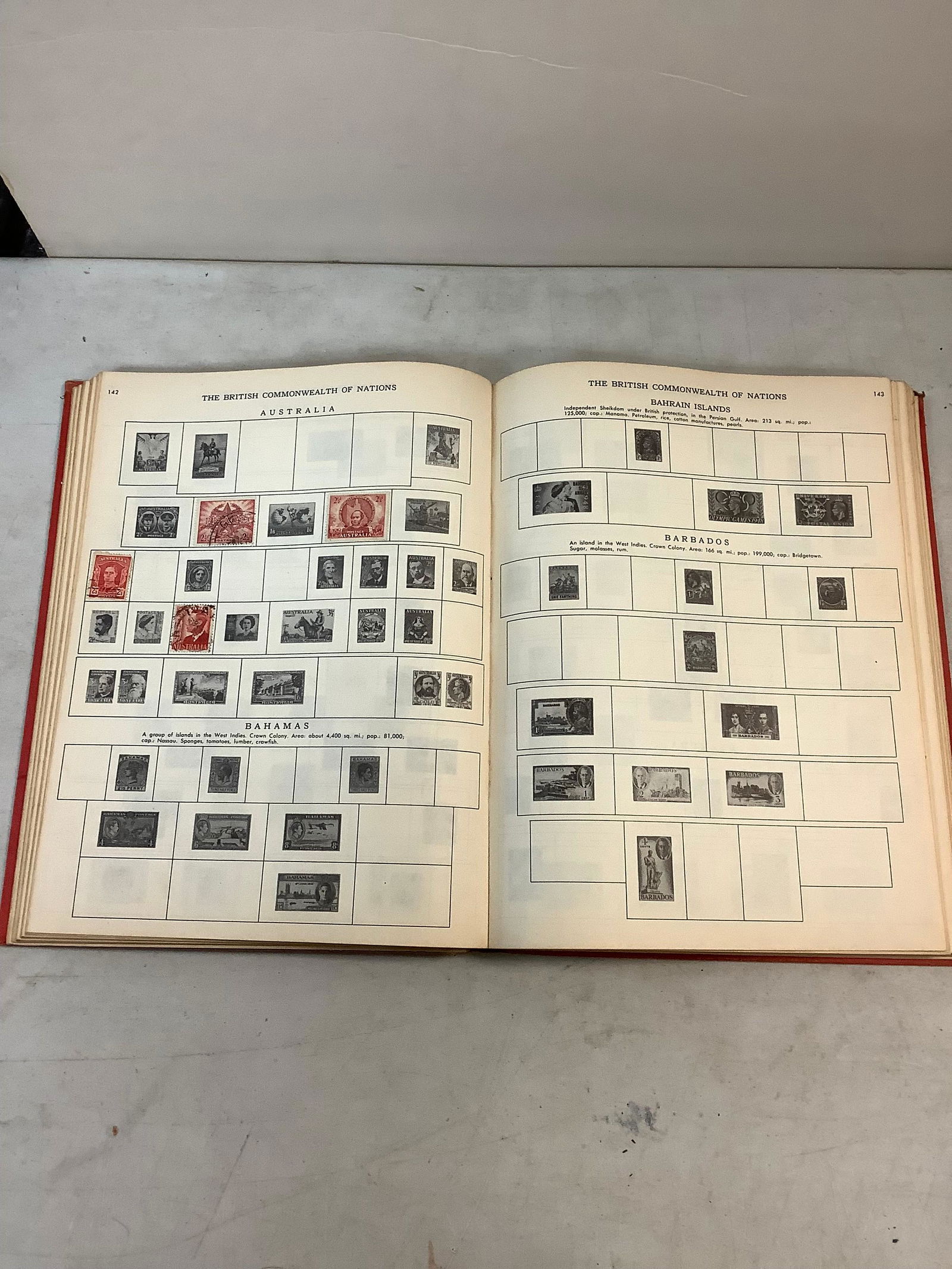 The New world wide postage stamp album with some stamps (1 of 1)