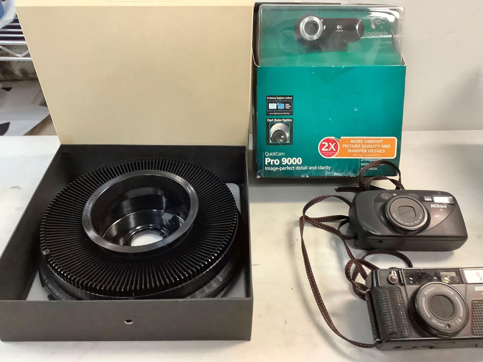 Lot of cameras Quickcam Pro 9000, Nikon Zoom touch 470 AF, Nikon One touch and Kodak Carousel 140 (1 of 1)