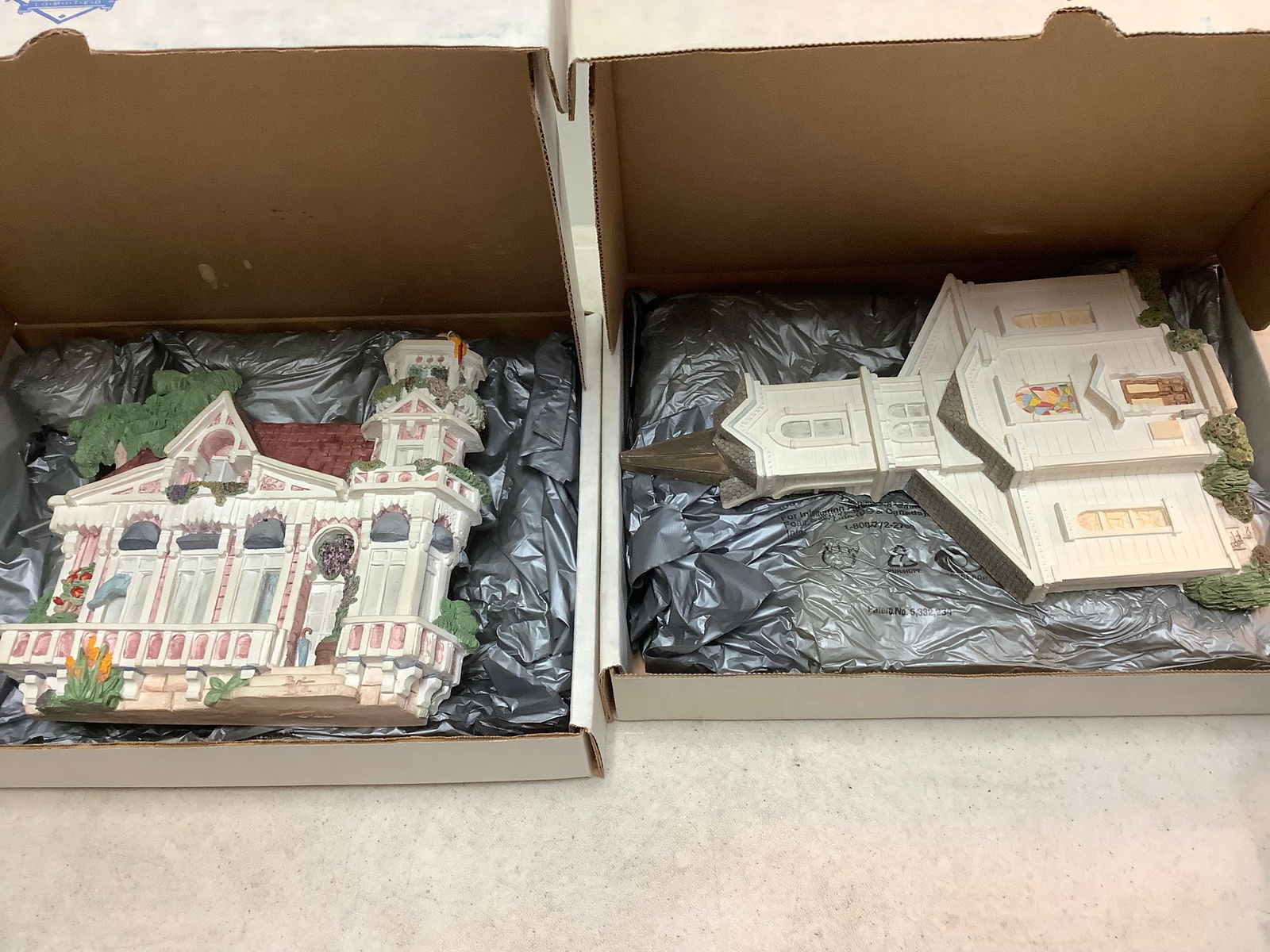 Brian bakers 1 is signed 1 is not wall hanging house (1 of 1)