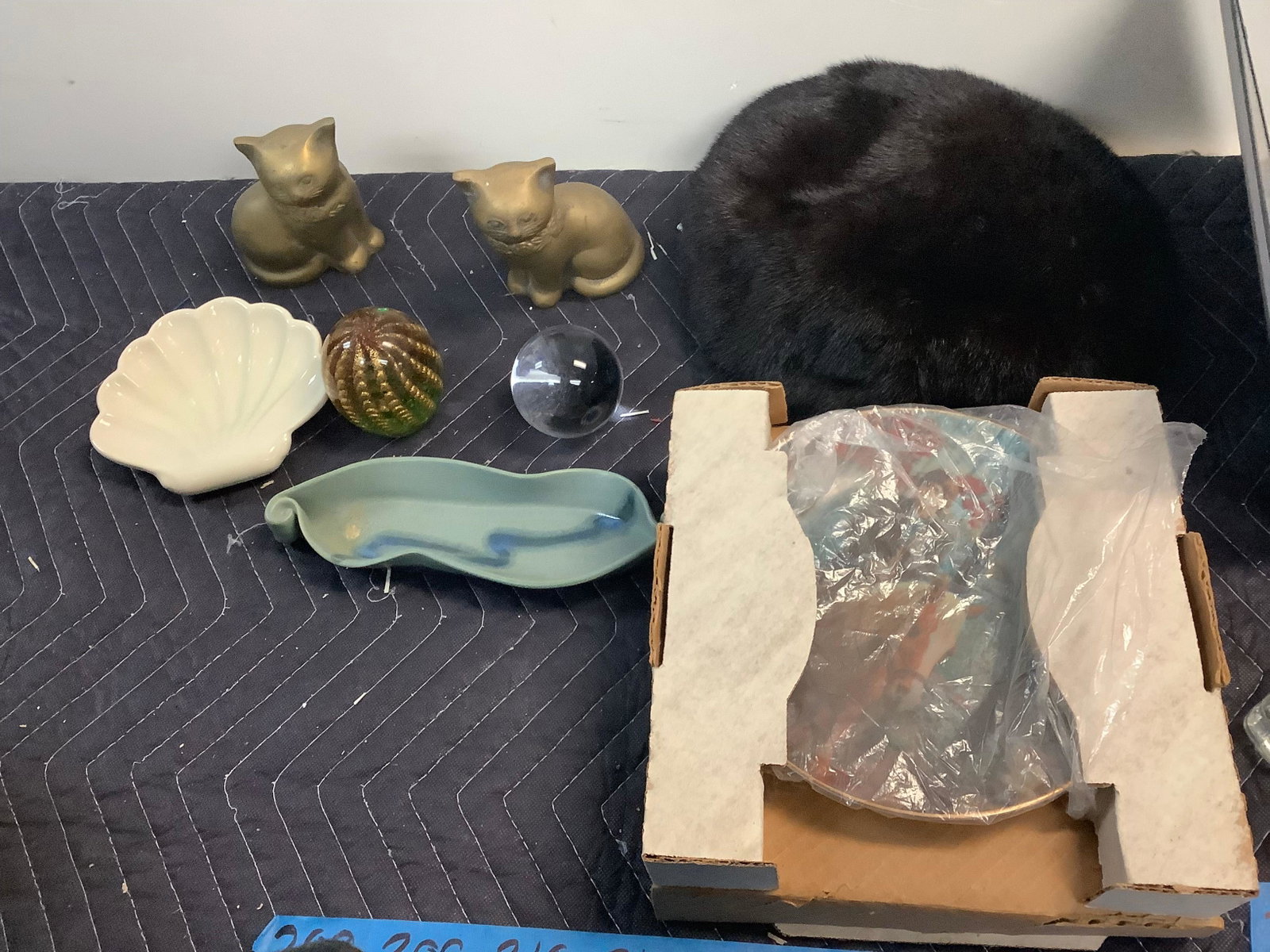 Fur hat, Rob Sauber plate, cat statues and more: Fur hat, Rob Sauber plate, cat statues and more