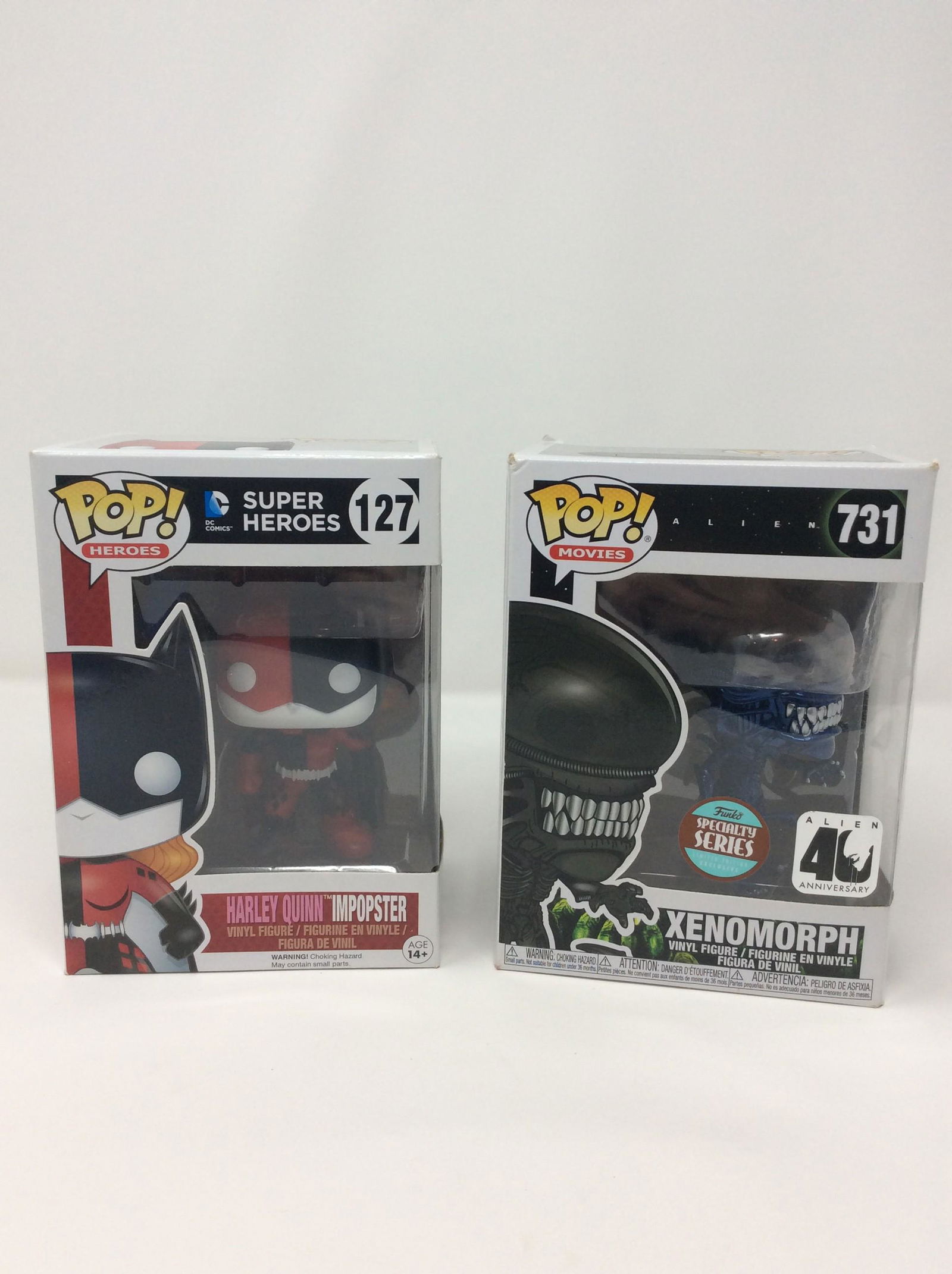 Lot of 2 Funko Pops, Including #127 Super Heroes Harley Quinn and #731 40th Ann. Specialty Series (1 of 1)