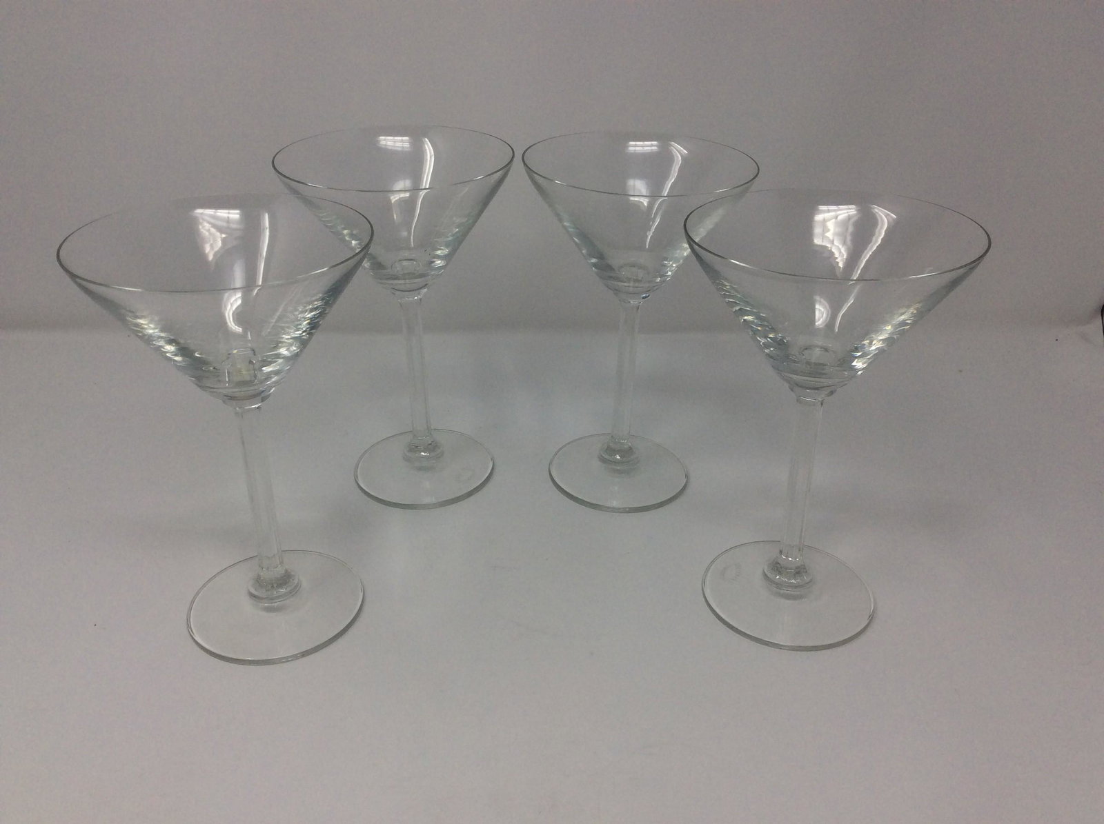 Lot of 4 Clear martini glasses marked xoilly phat vermouth: perfect condition