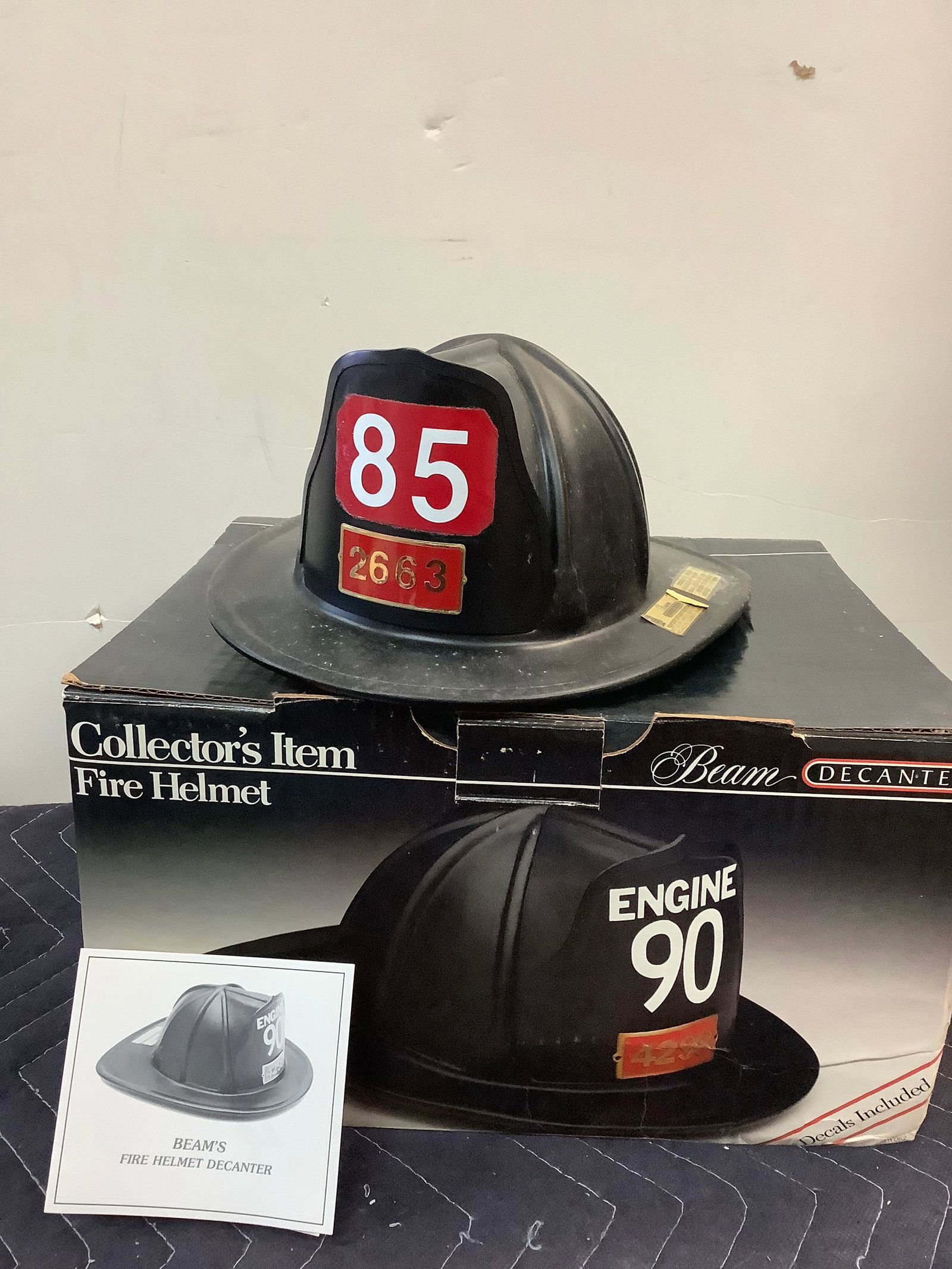 Collector's Item Fire Helmet Beam Decanter Sealed: Any contents in bottle is Free; You are bidding on the bottle & unbroken tax stamp
