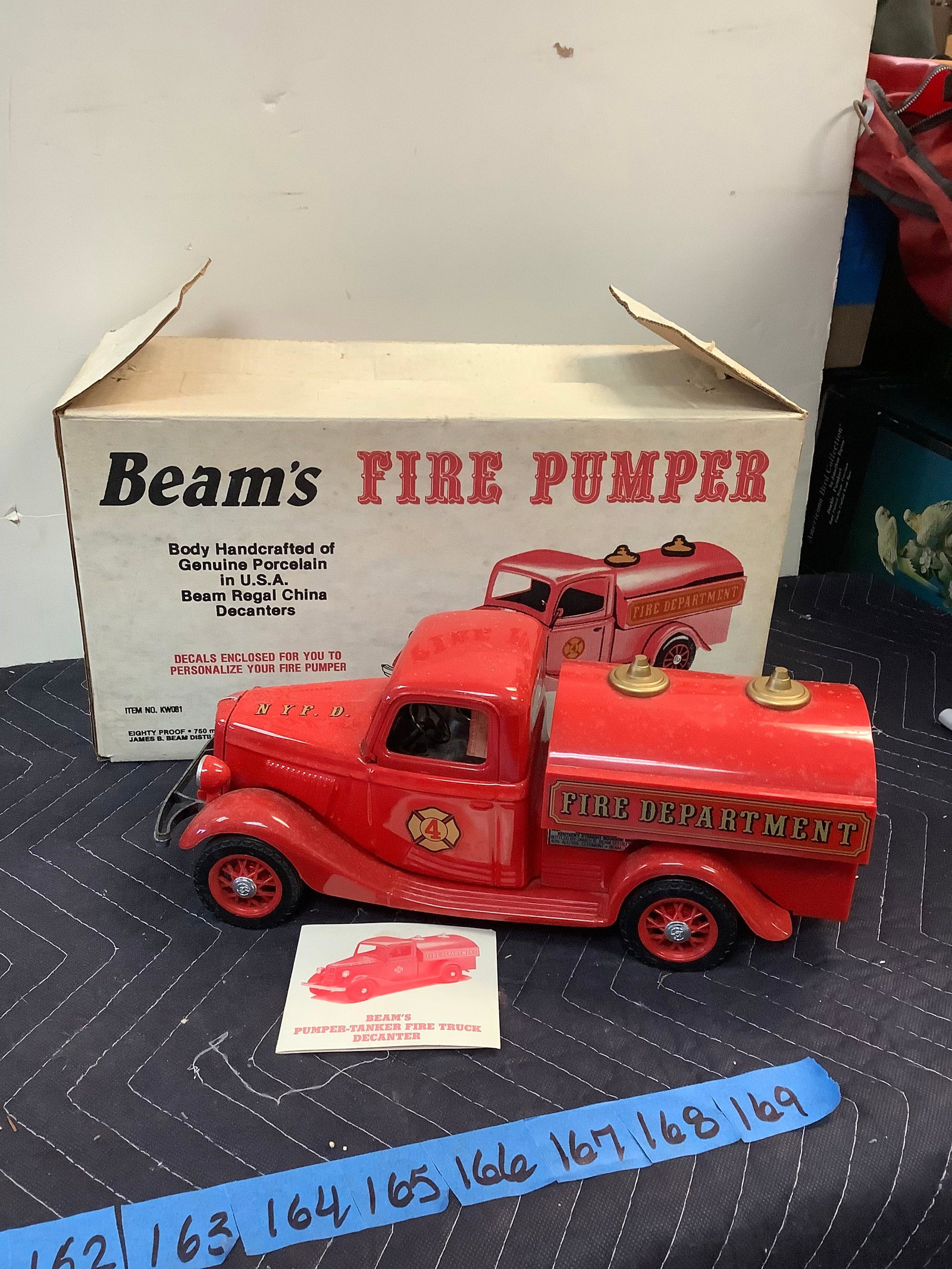 Beam's Pumper-trainer Fire truck Decanter Sealed: Any contents in bottle is Free; You are bidding on the bottle & unbroken tax stamp