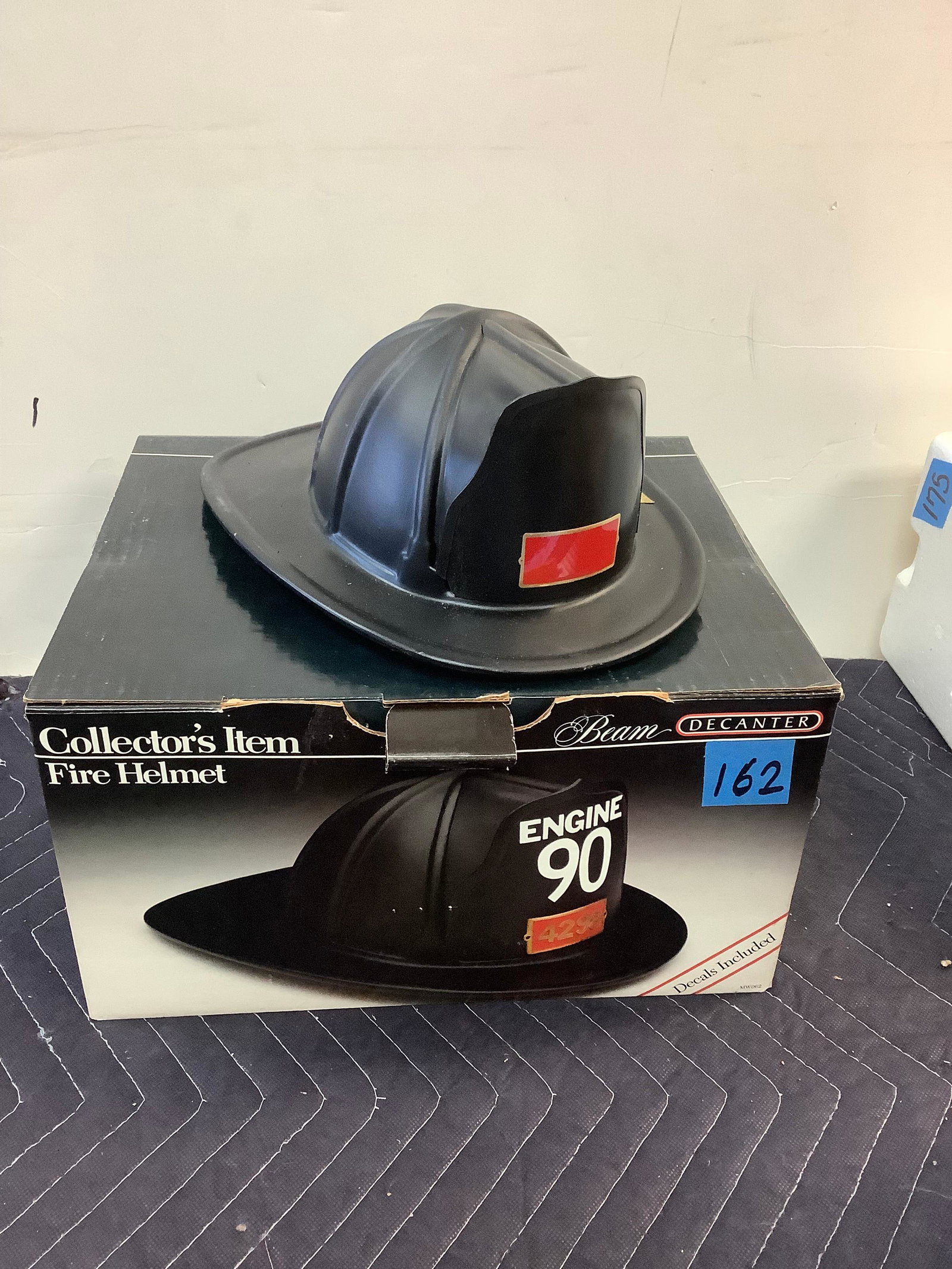 Collector's Item Fire Helmet Beam Decanter Sealed: Any contents in bottle is Free; You are bidding on the bottle & unbroken tax stamp