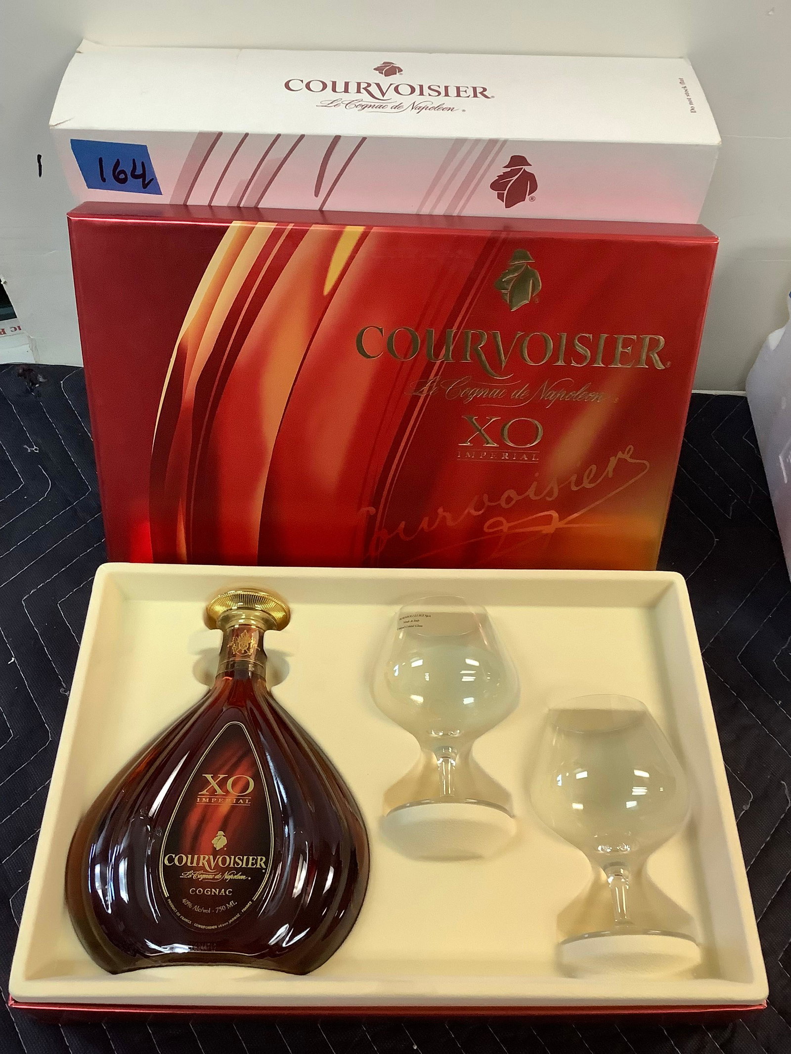 Courvoisier Le Cognac de Napoleon 750 ML sealed: Any contents in bottle is Free; You are bidding on the bottle & unbroken tax stamp