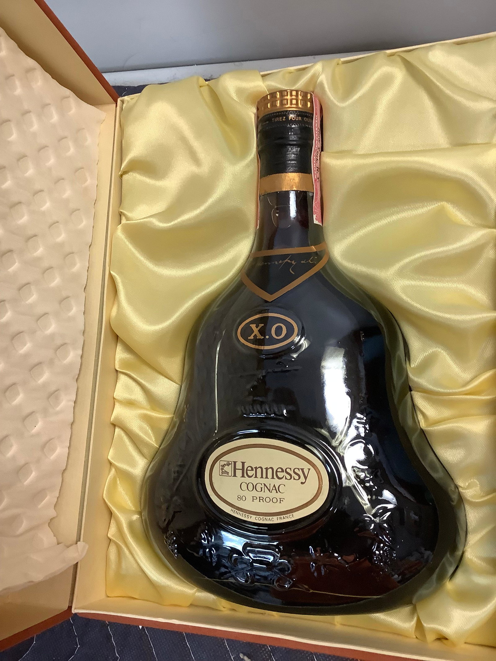X.O Hennessy Cognac sealed: Any contents in bottle is Free; You are bidding on the bottle & unbroken tax stamp