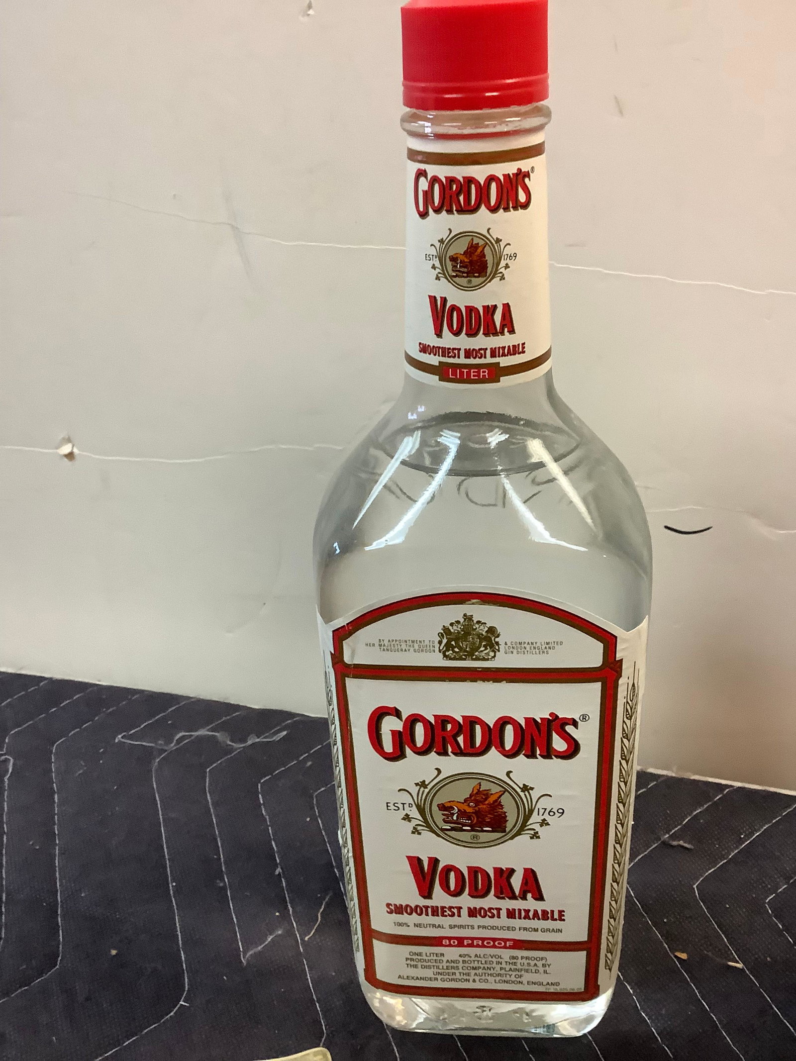 gordons Smoothest most mixable Vodka: Any contents in bottle is Free; You are bidding on the bottle & unbroken tax stamp