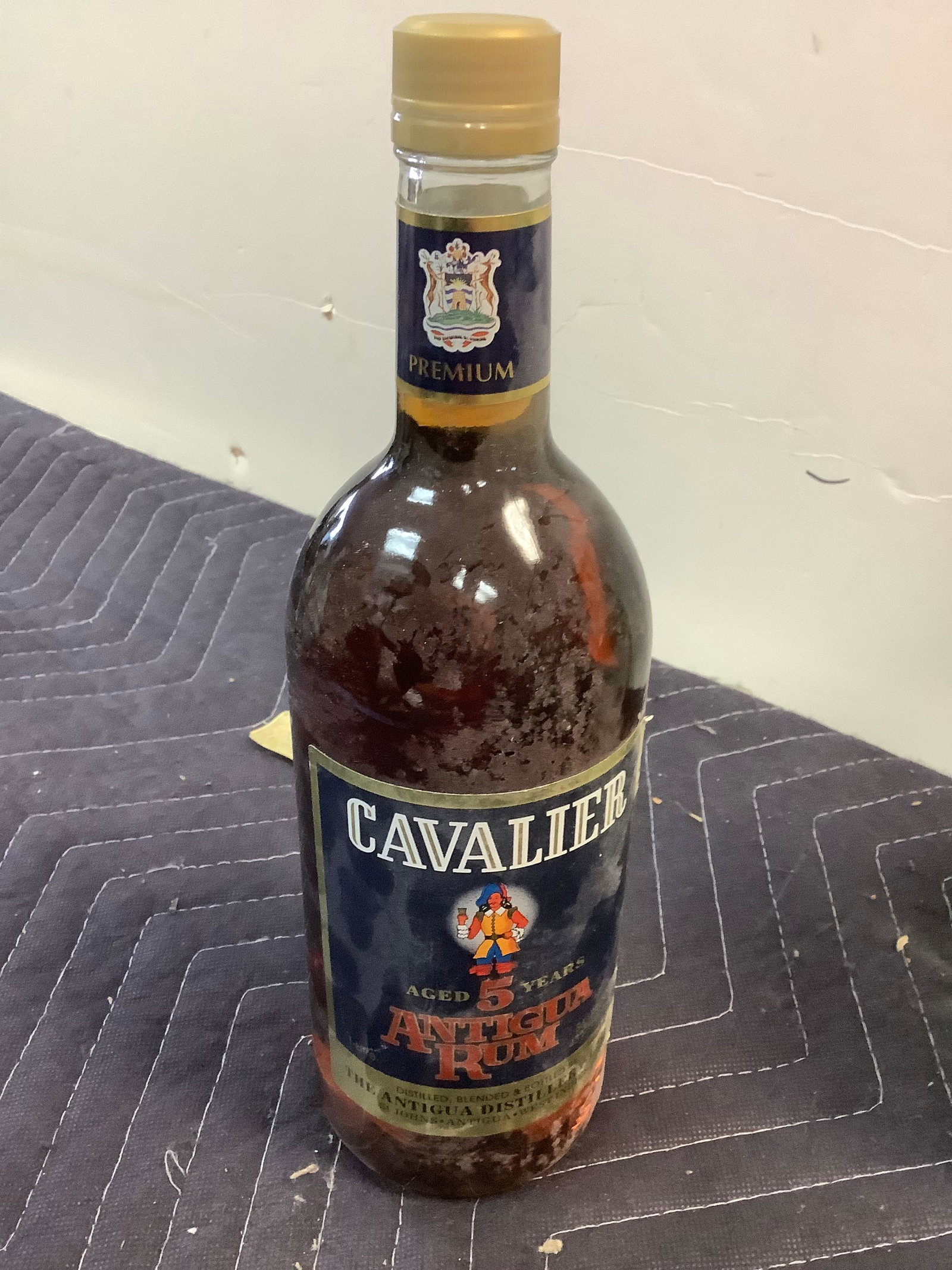 Cavalier Antigua Rum: Any contents in bottle is Free; You are bidding on the bottle & unbroken tax stamp