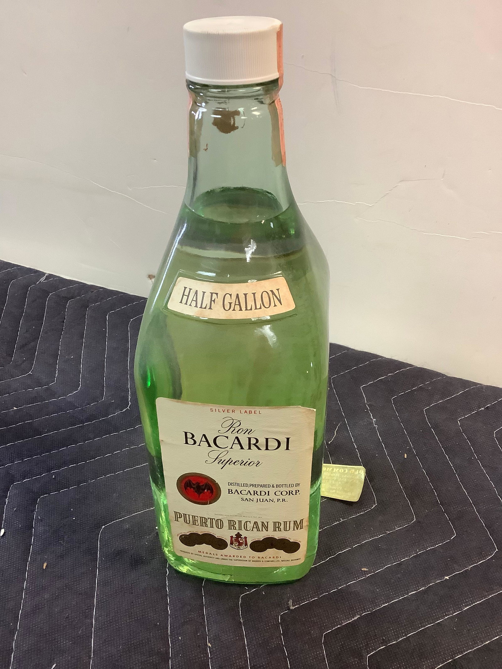 Half Gallon Ron Bacardi Puerto Rican Rum: Any contents in bottle is Free; You are bidding on the bottle & unbroken tax stamp