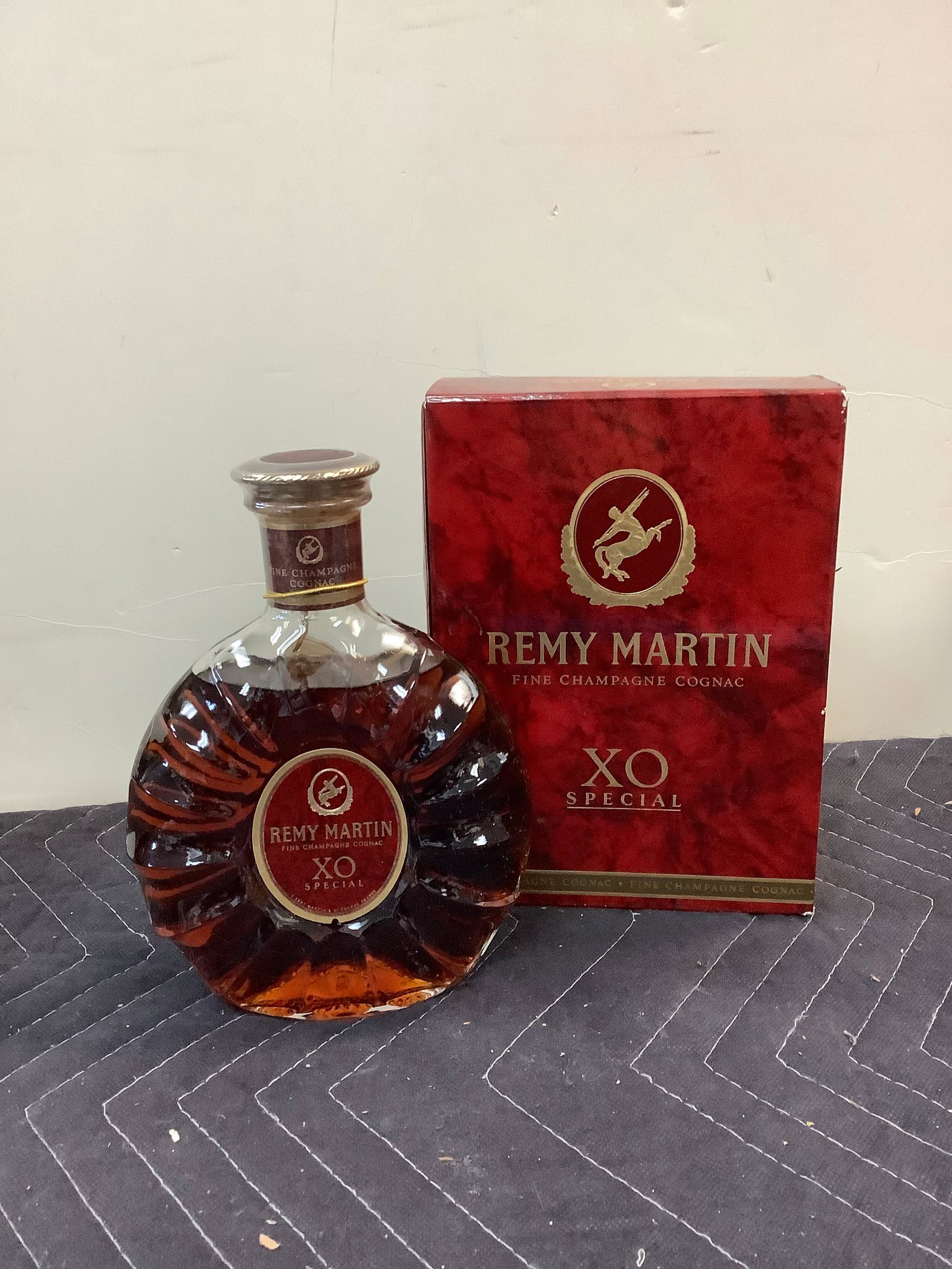 XO special Remy Martin Fine Champagne Cognac sealed: Any contents in bottle is Free; You are bidding on the bottle & unbroken tax stamp