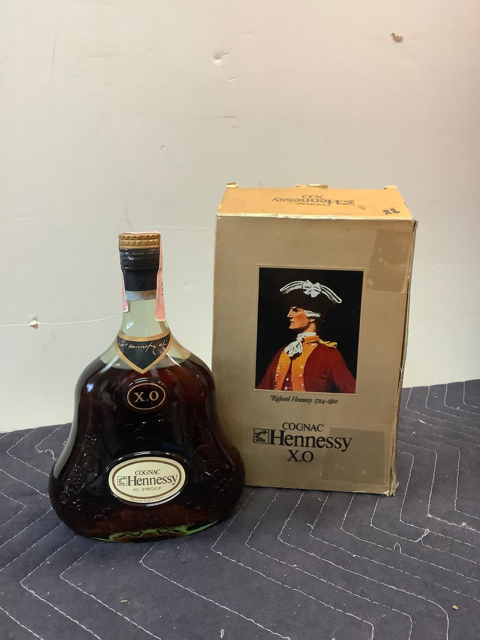 X.O Hennessy Cognac sealed: Any contents in bottle is Free; You are bidding on the bottle & unbroken tax stamp