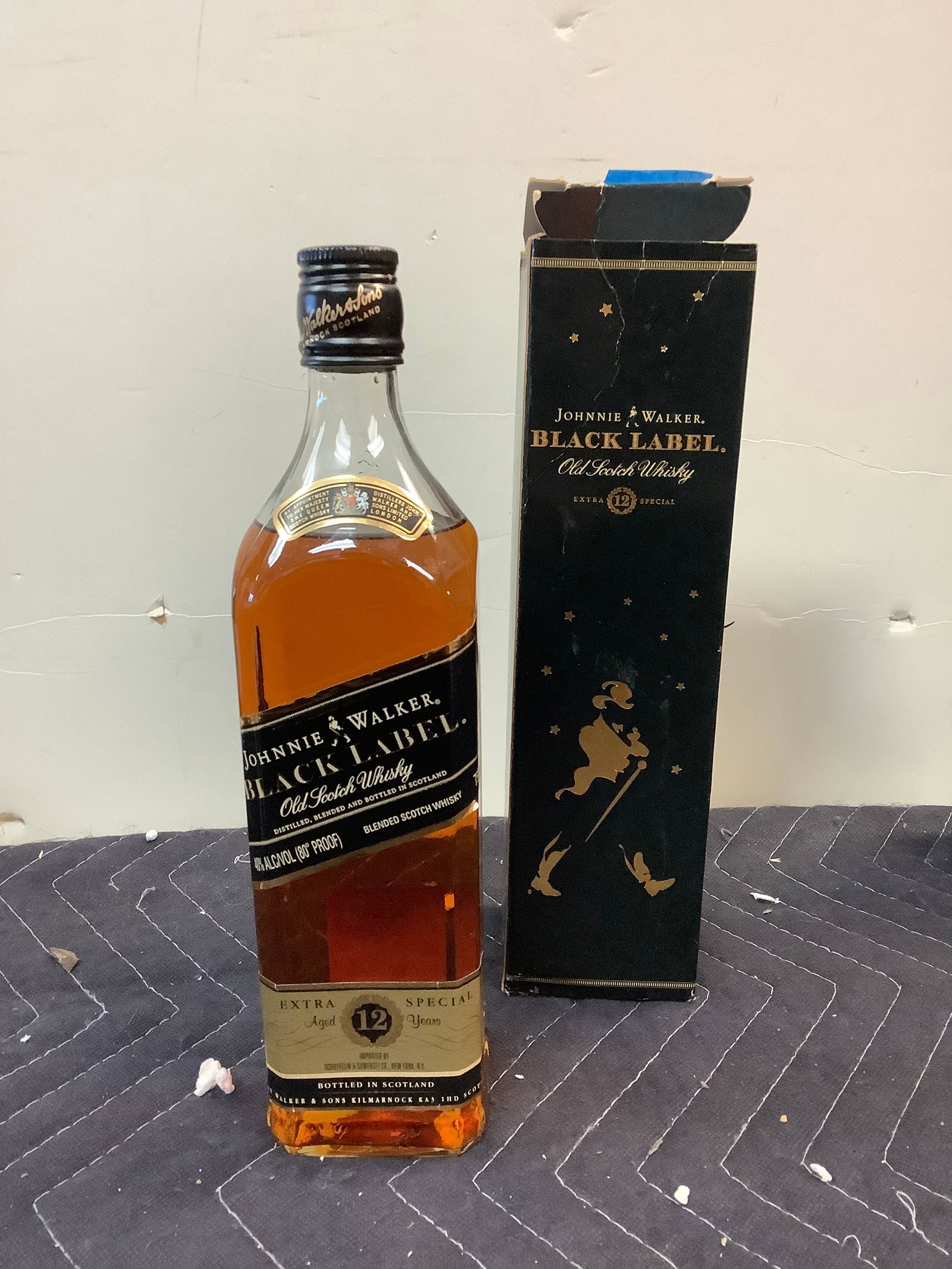 Johnnie Walker Black label Old Scotch Whisky sealed: Any contents in bottle is Free; You are bidding on the bottle & unbroken tax stamp