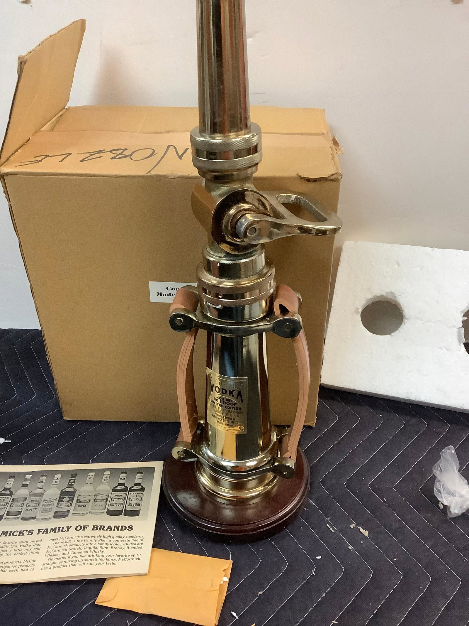 McCormick Vodka Fire Nozzle Decanter - 200ML Sealed: Any contents in bottle is Free; You are bidding on the bottle & unbroken tax stamp