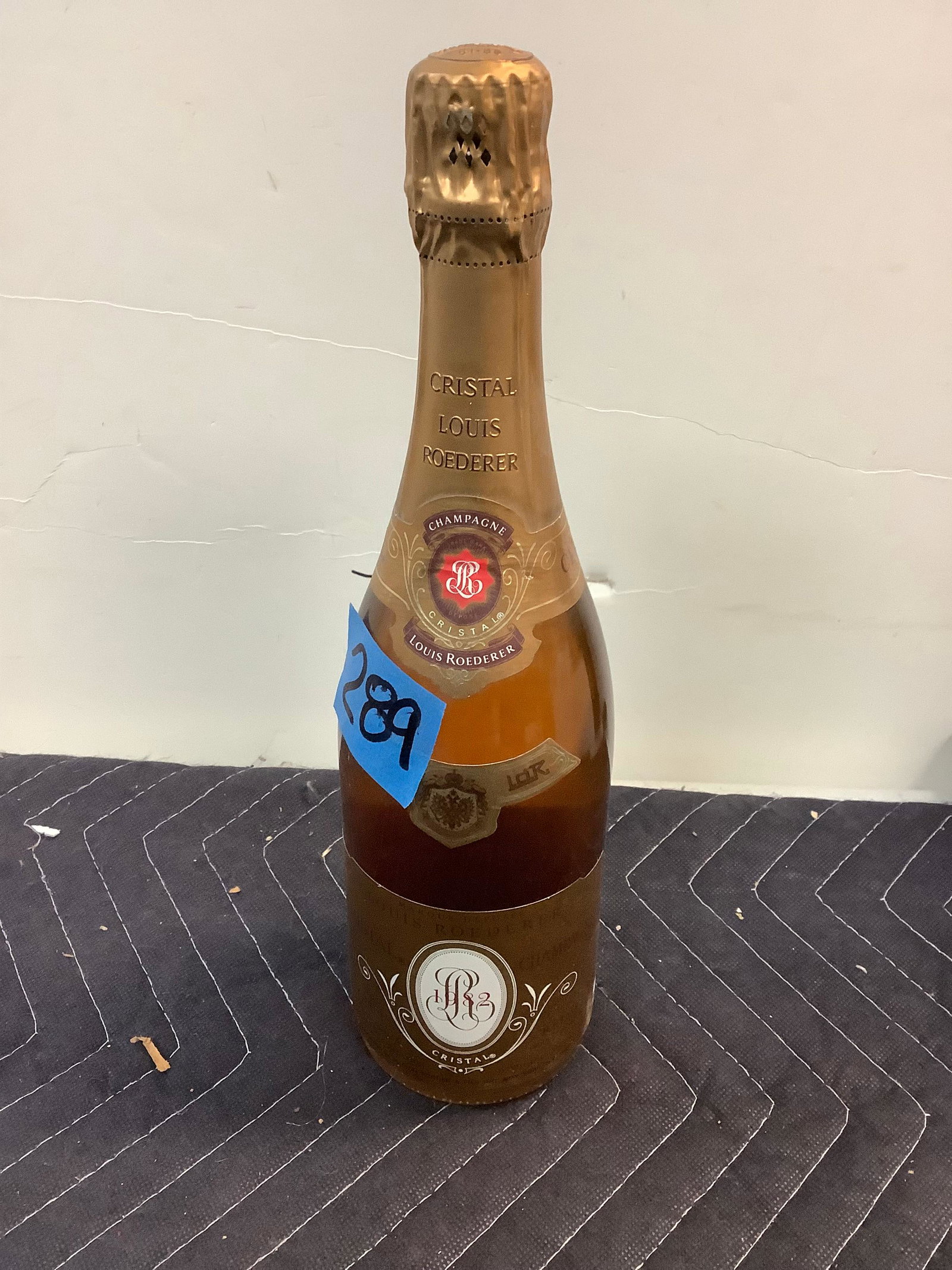 Cristal Louis Roederer Champagne - sealed: Any contents in bottle is Free; You are bidding on the bottle & unbroken tax stamp