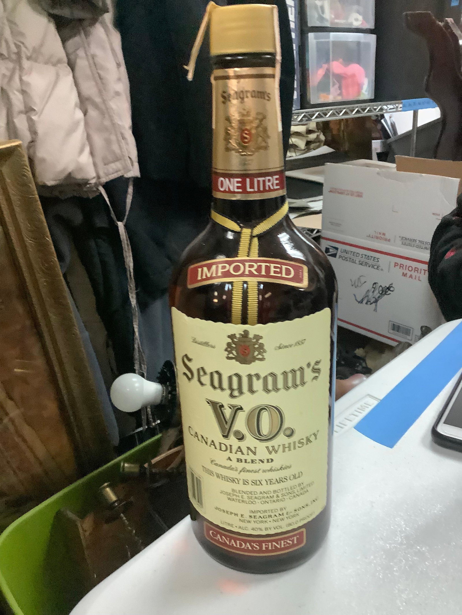 Seagram's v.o. whiskey 1986: Any contents in bottle is Free; You are bidding on the bottle & unbroken tax stamp