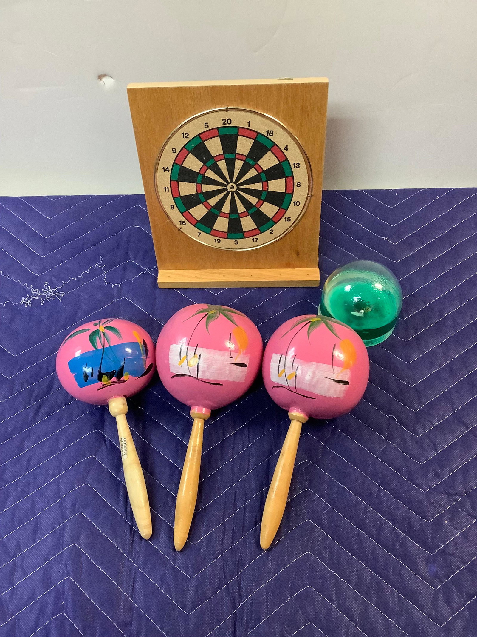 Lot of Hand Painted Maracas, Wooden Dart Board and Water Globe: Lot of Hand Painted Maracas, Wooden Dart Board and Water Globe