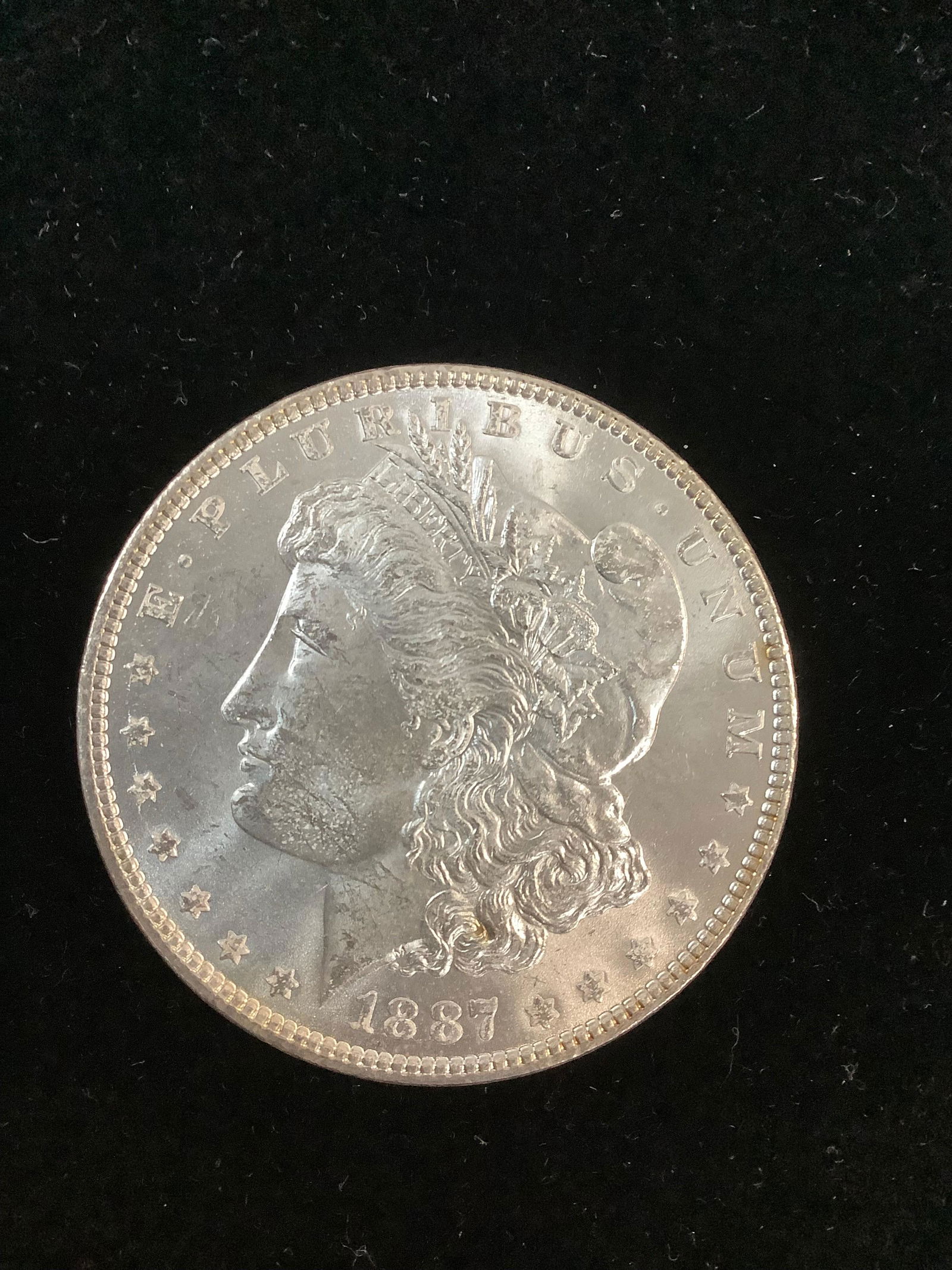 1887 uncirculated silver morgan dollar coin (1 of 1)