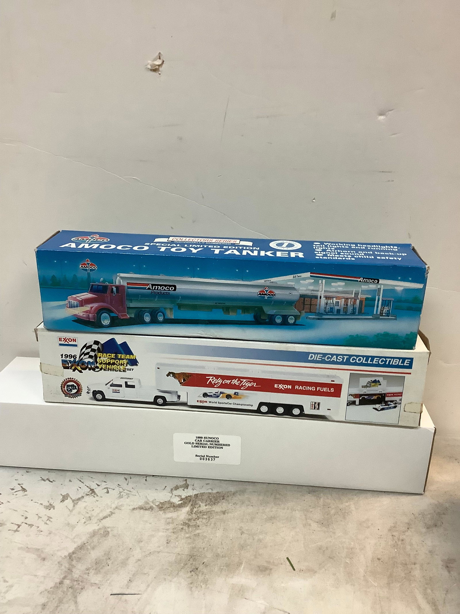 lot of 1999 Sunoco car carrier, Exxon truck, and Amoco truck: lot of 1999 Sunoco car carrier, Exxon truck, and Amoco truck