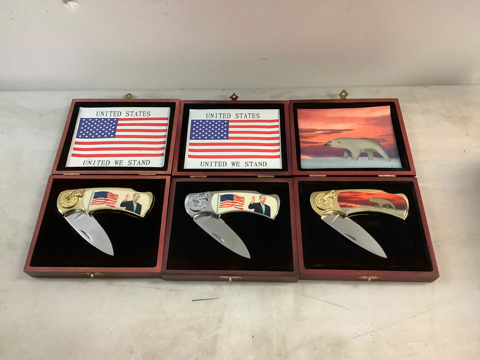 Lot of polar bear and USA knives in cases (1 of 1)