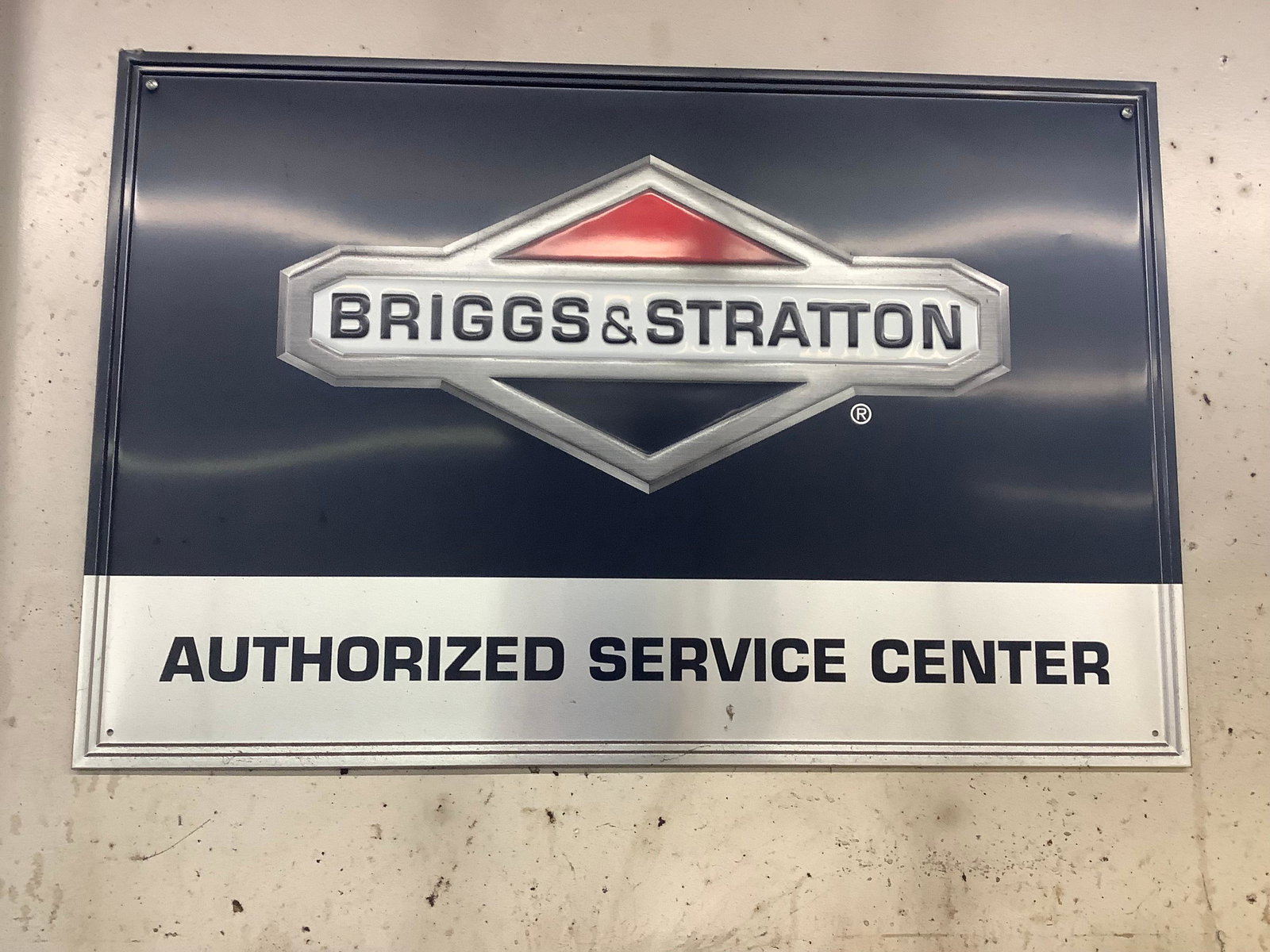 Metal briggs and stratton sign (1 of 1)