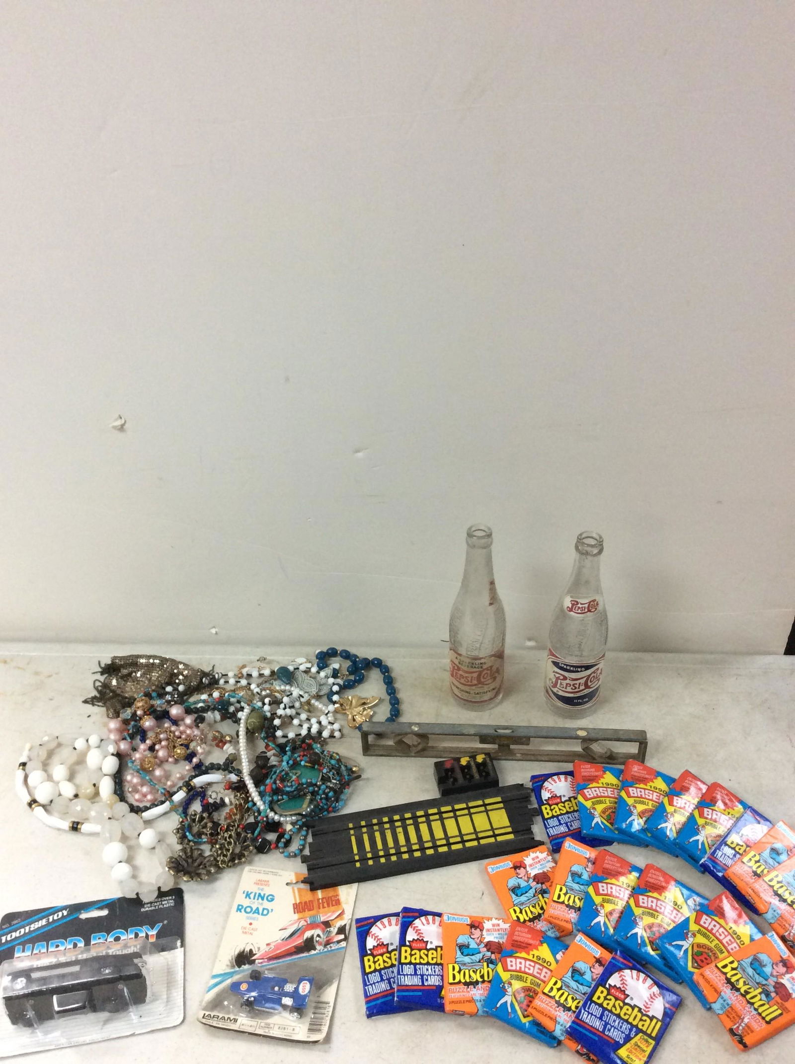 Lot of vintage pepsi-cola bottles(tallest 9.75â€™â€™x2.5â€™â€™), assorted jewelry, vintage dornuss (1 of 1)