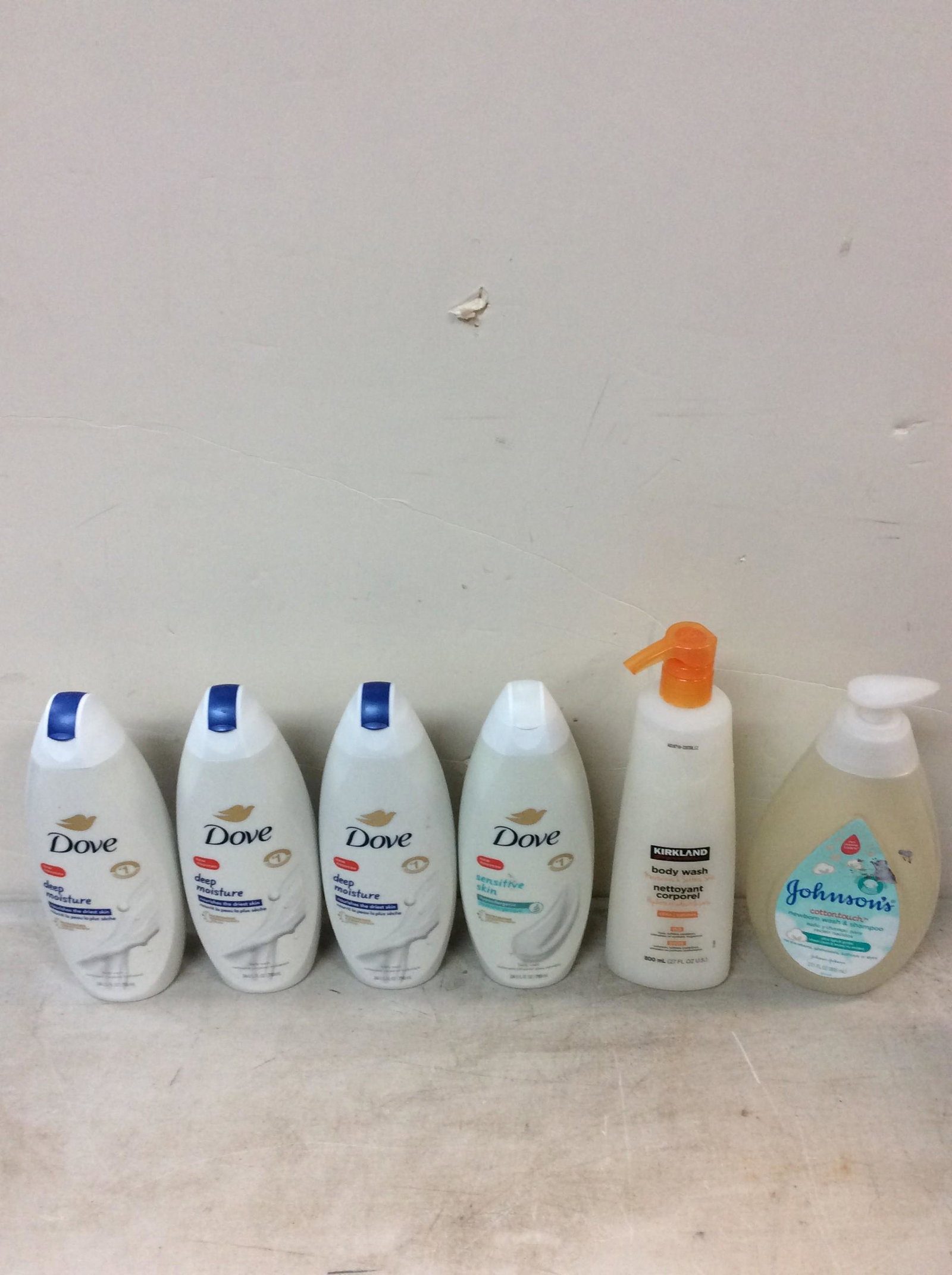 Lot of body wash (dove, kirkland), and johnsons newborn wash and shampoo (1 of 1)