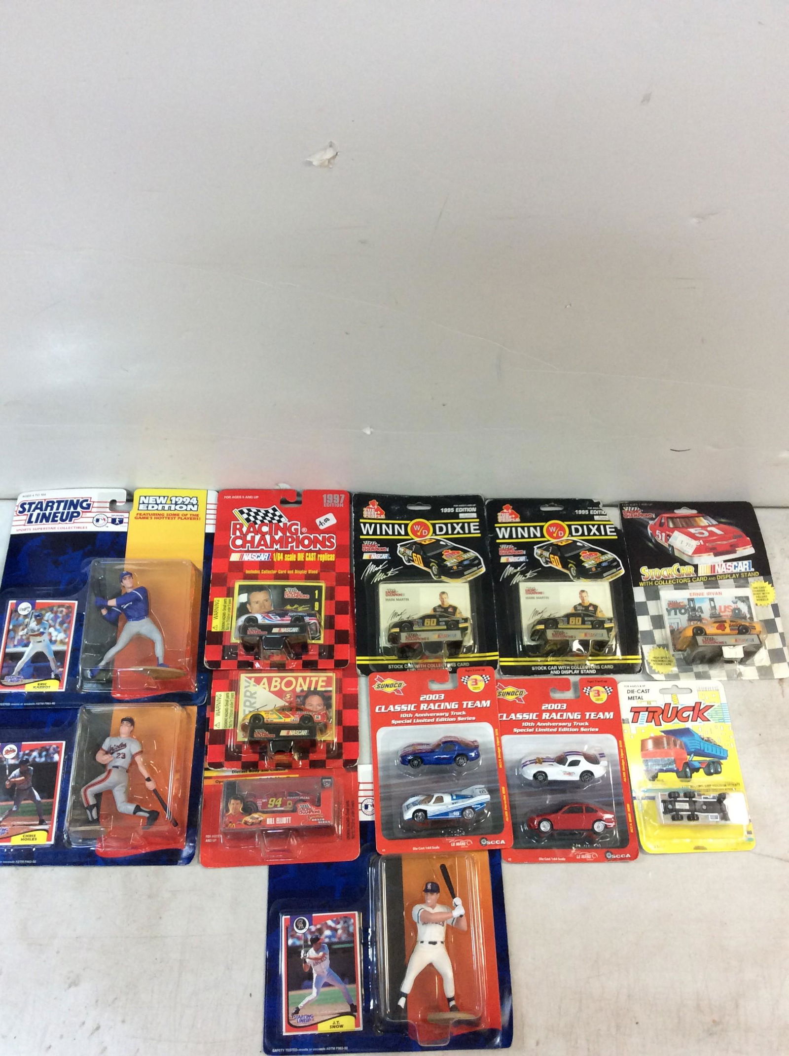 Lot of racecar models and baseball action figures with playing cards (1 of 1)