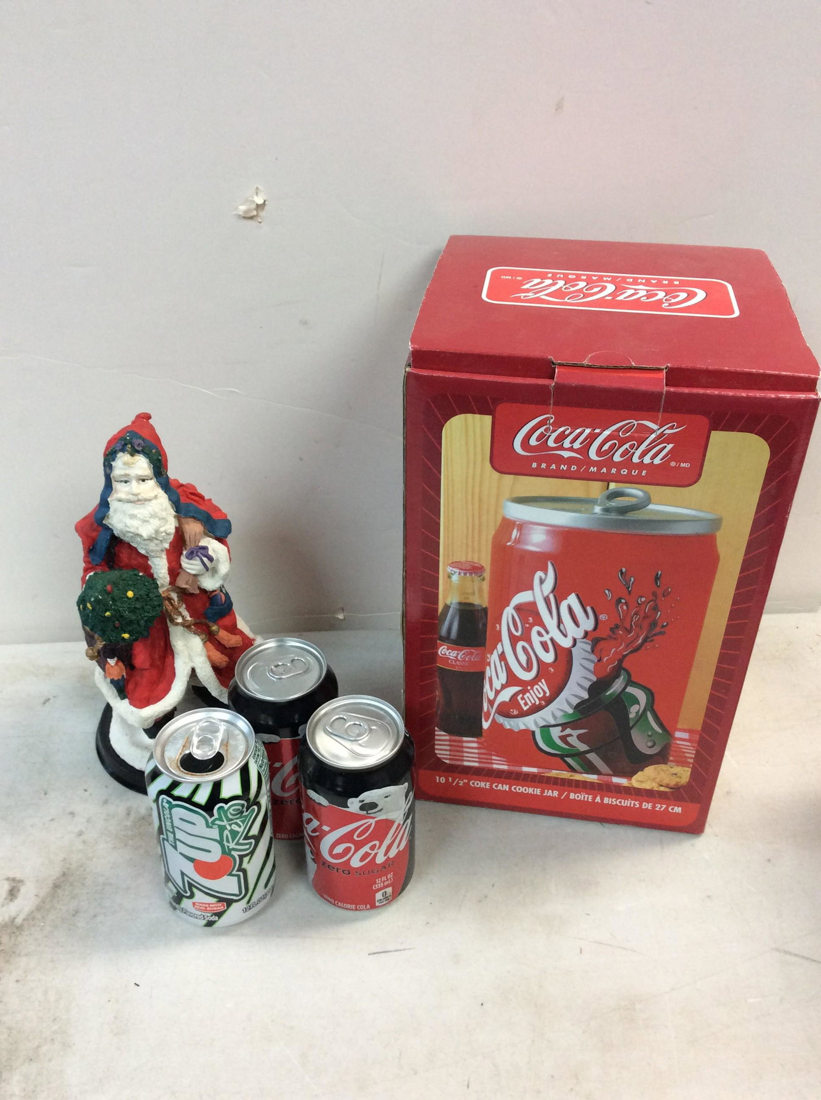 Coke can cookie jar 11in and holiday figure: Coke can cookie jar 11in and holiday figure