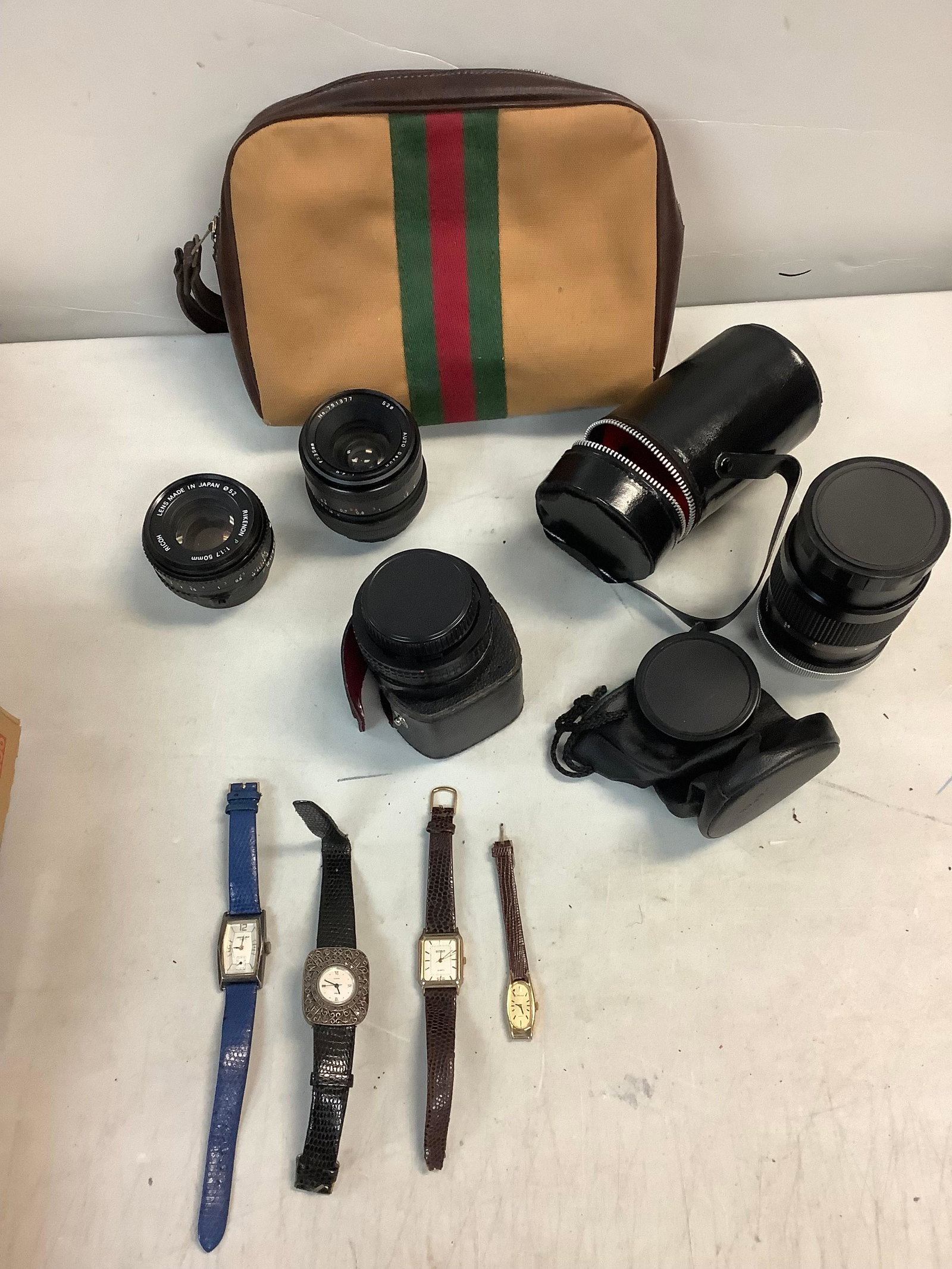 Assorted watches and camera lens'(35 mm, 50mm, 135mm) with three cases (1 of 1)