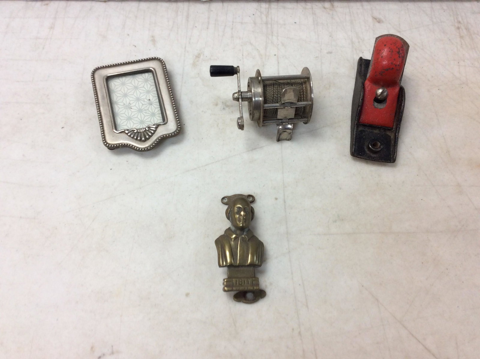 Lot of photo frame, fishing reel, wood plane, and more: Lot of photo frame, fishing reel, wood plane, and more