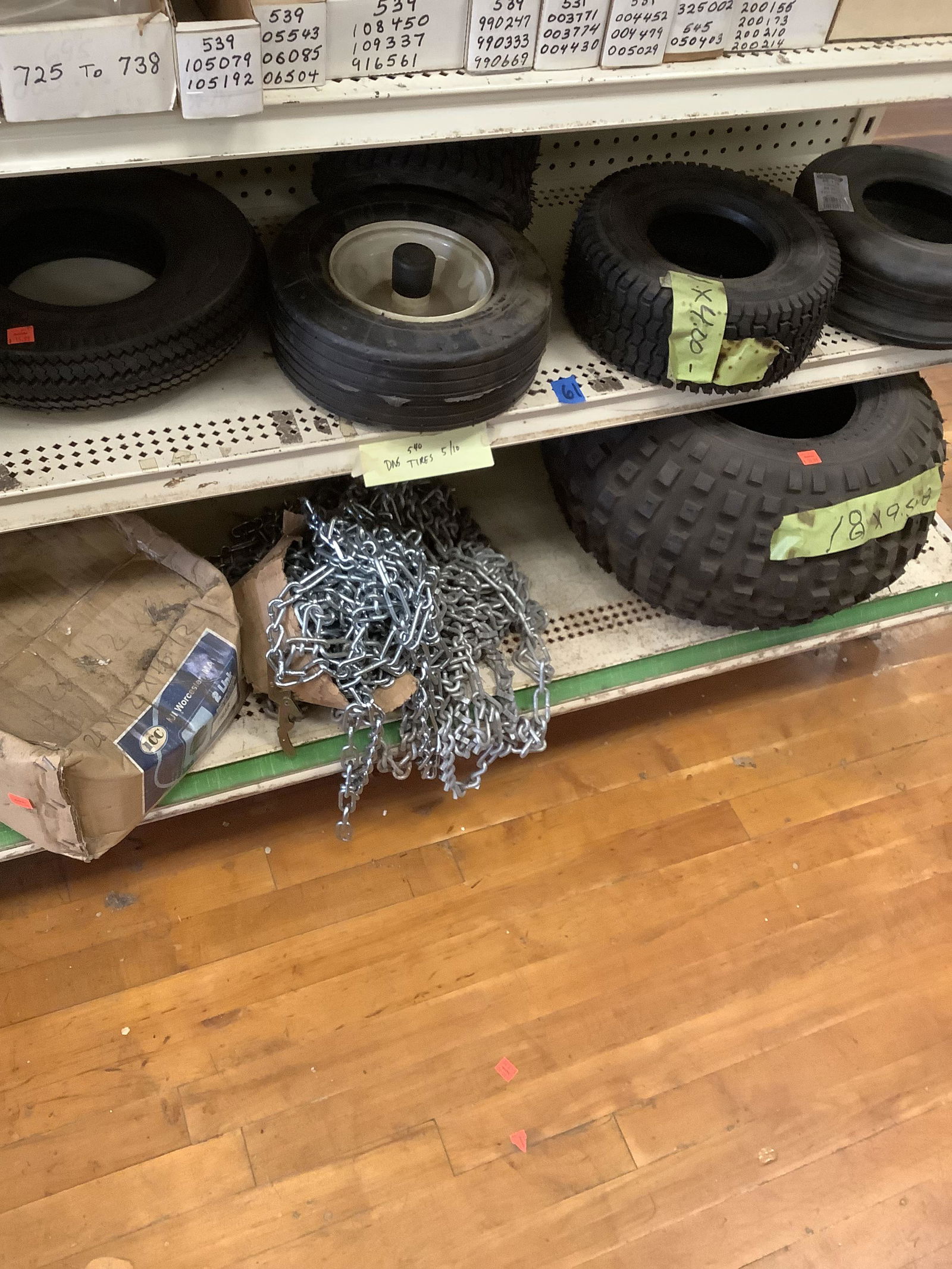 Lot of various sized tires & tire chains (1 of 1)