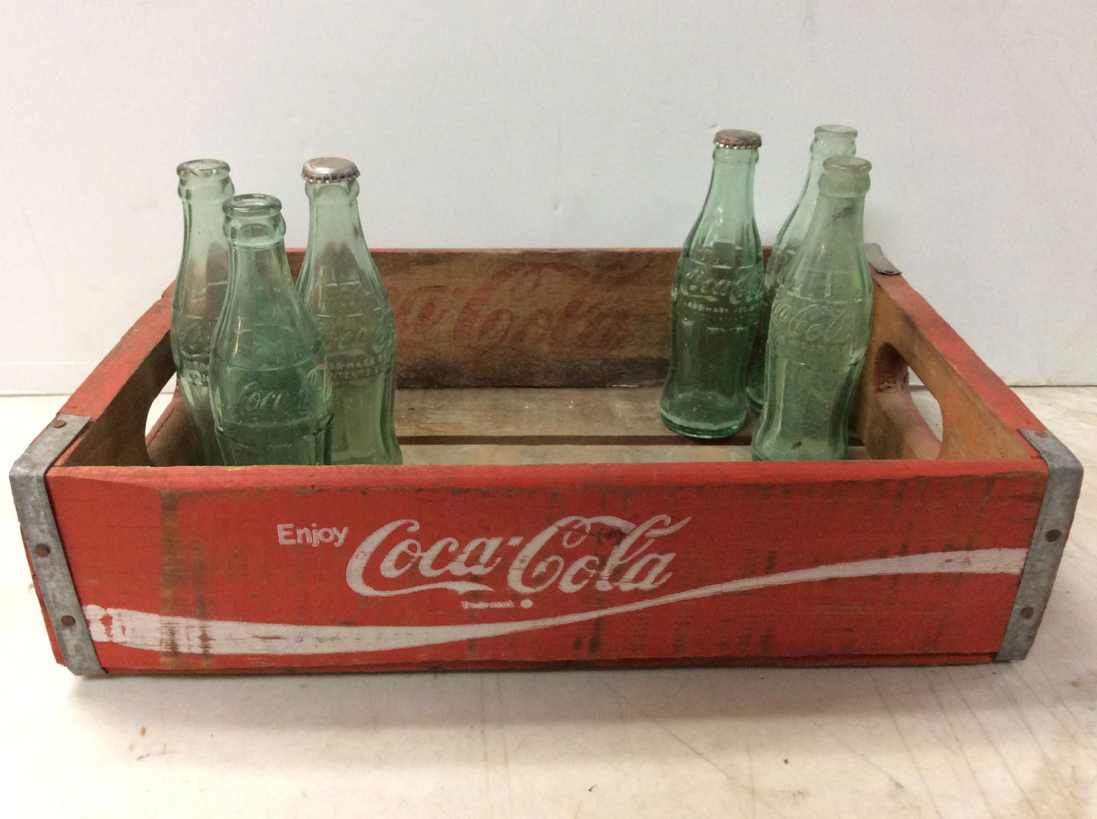 Vintage coca-cola bottles in case (1 of 1)