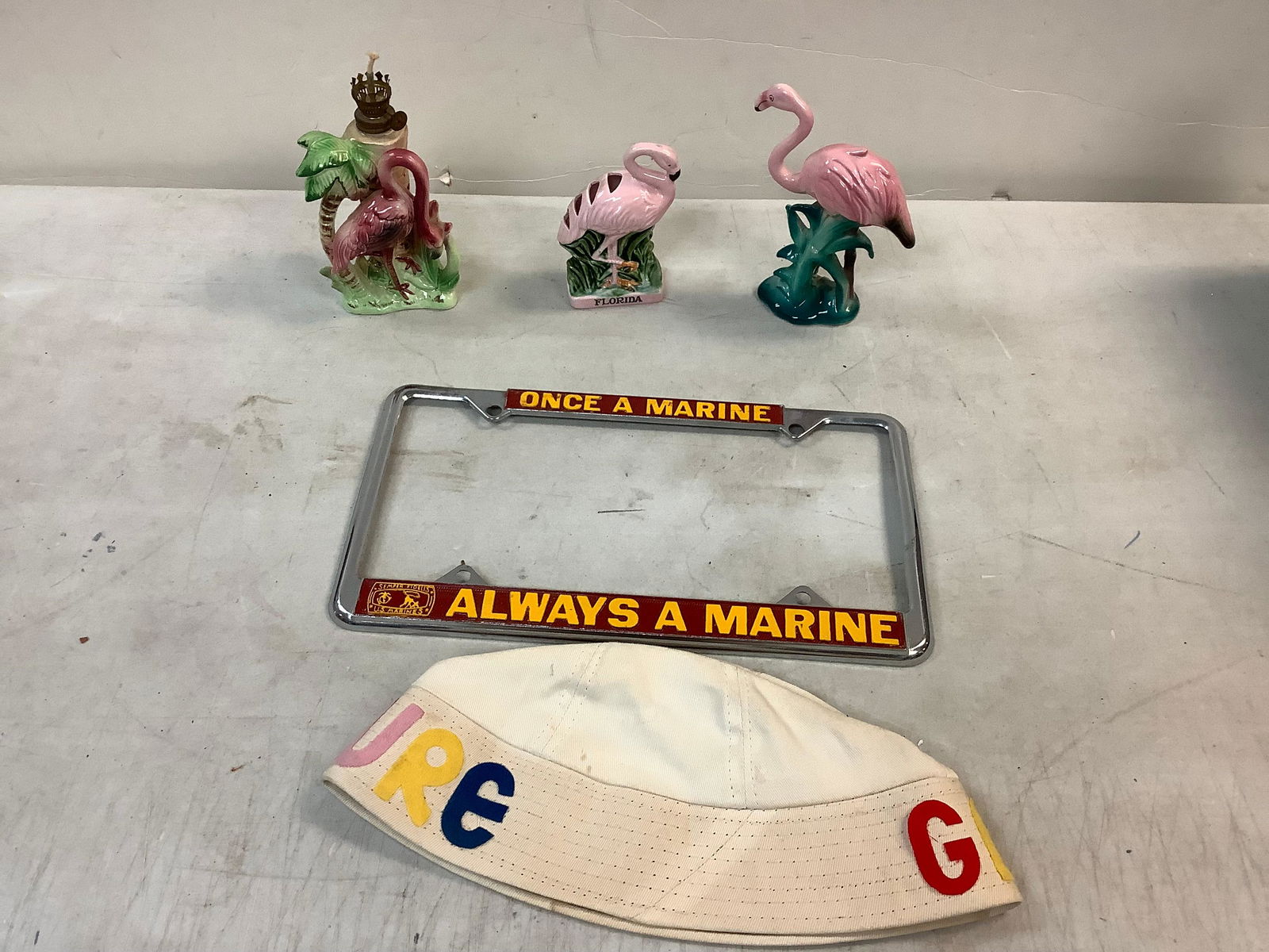 Lot of Ceramic Flamingo Figurines, (1 Fitz & Floyd), Flamingo Oil Light, License Plate Holder and (1 of 1)