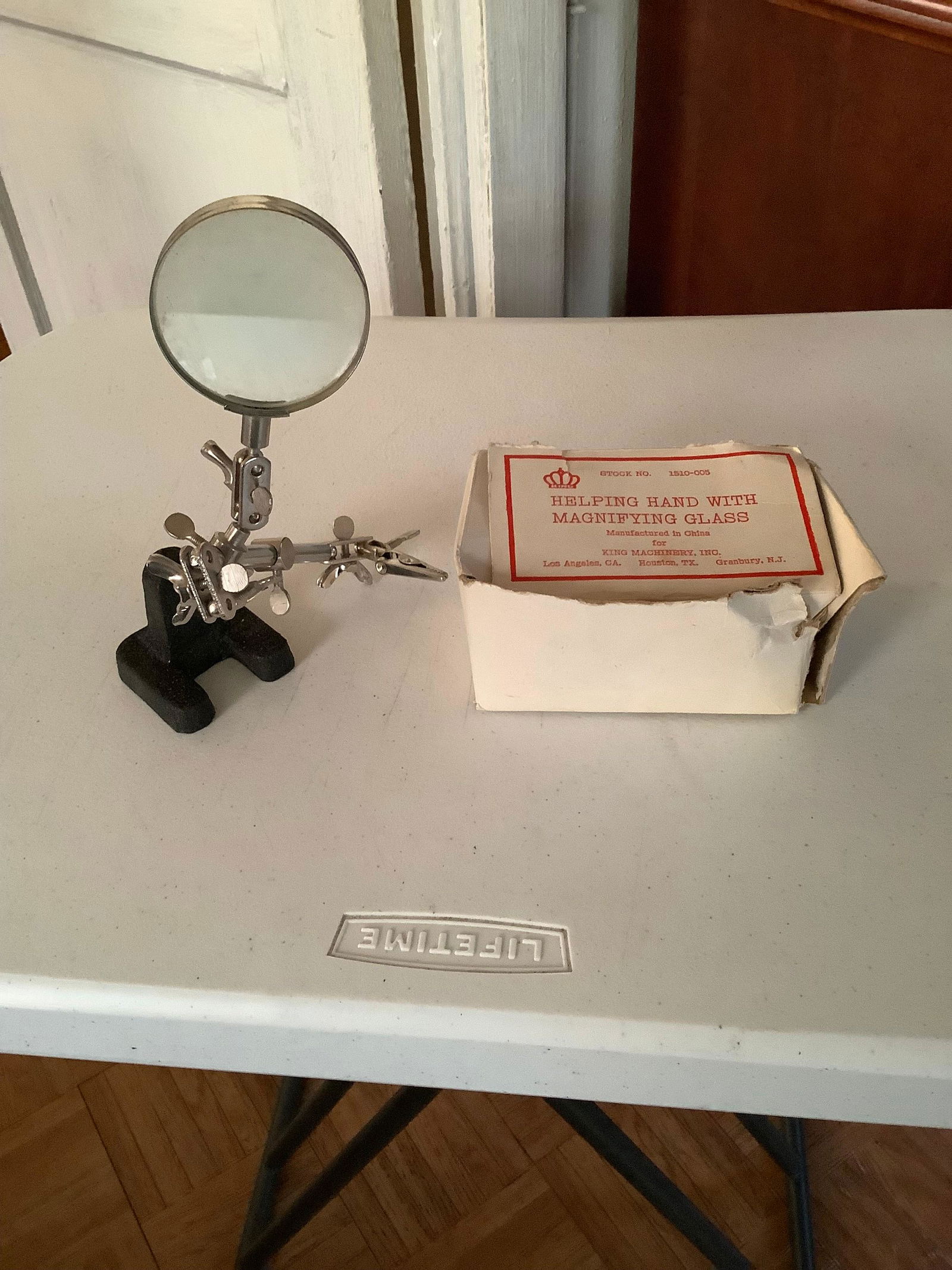 Helping Hand with Magnifying Glass (1 of 1)