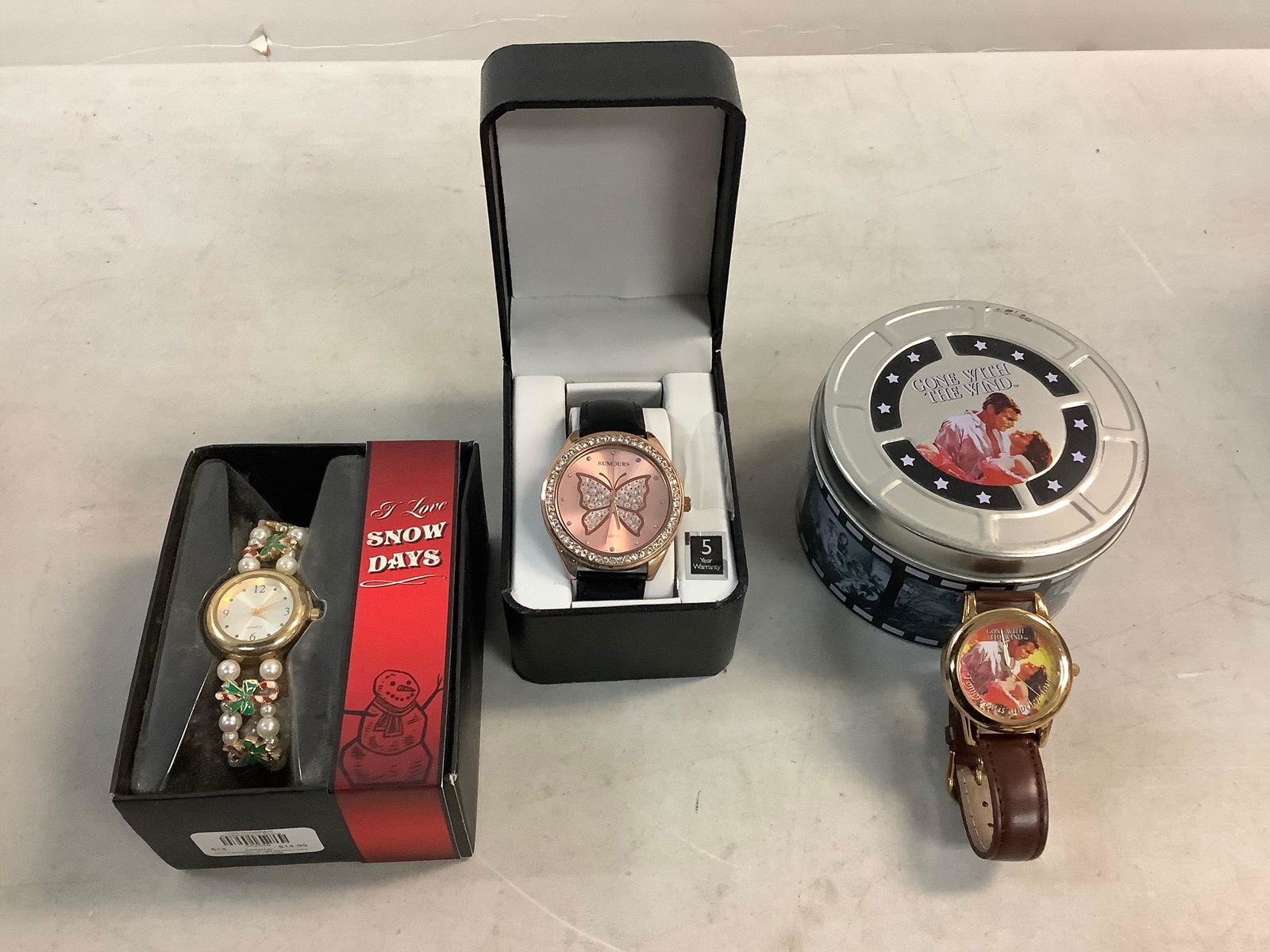 Lot of gone with the with with watch with tin case, I Love snow days watch and RUMOURS butterfly (1 of 1)