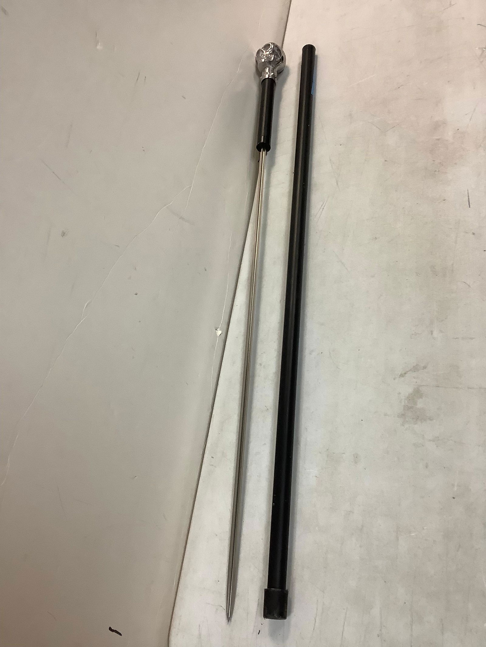 Skull head spring loaded walking stick (1 of 1)