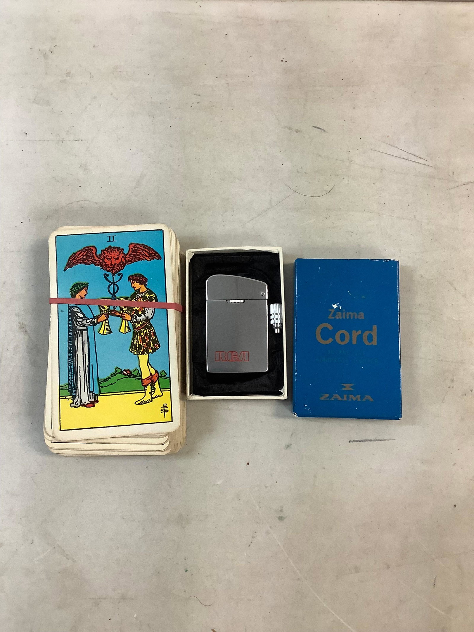 lot of taro cards and Zaima Cord RCA lighter: lot of taro cards and Zaima Cord RCA lighter
