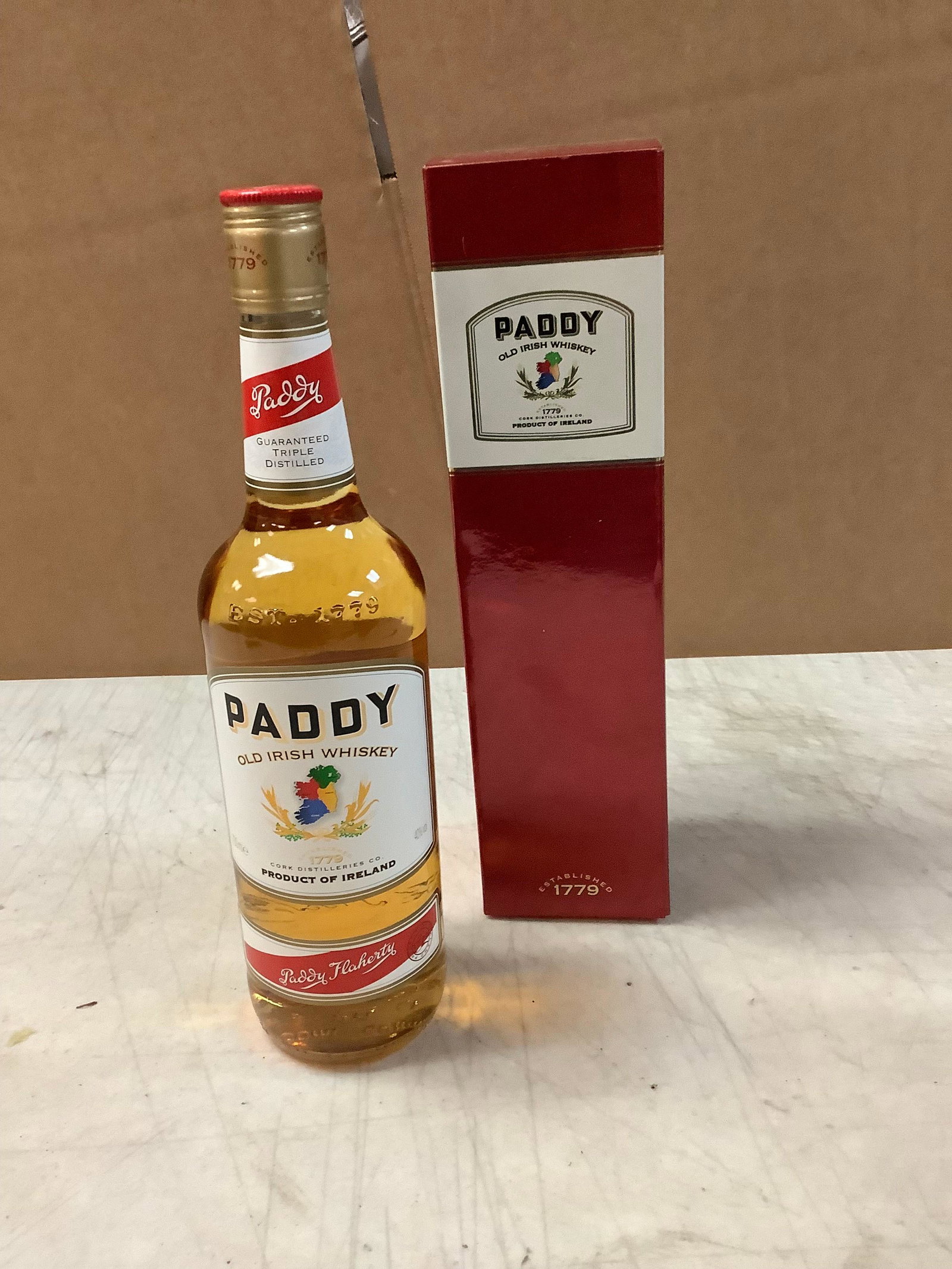 PADDY old irish whiskey unopened and in box: Any contents in bottle is Free; You are bidding on the bottle & unbroken tax stamp