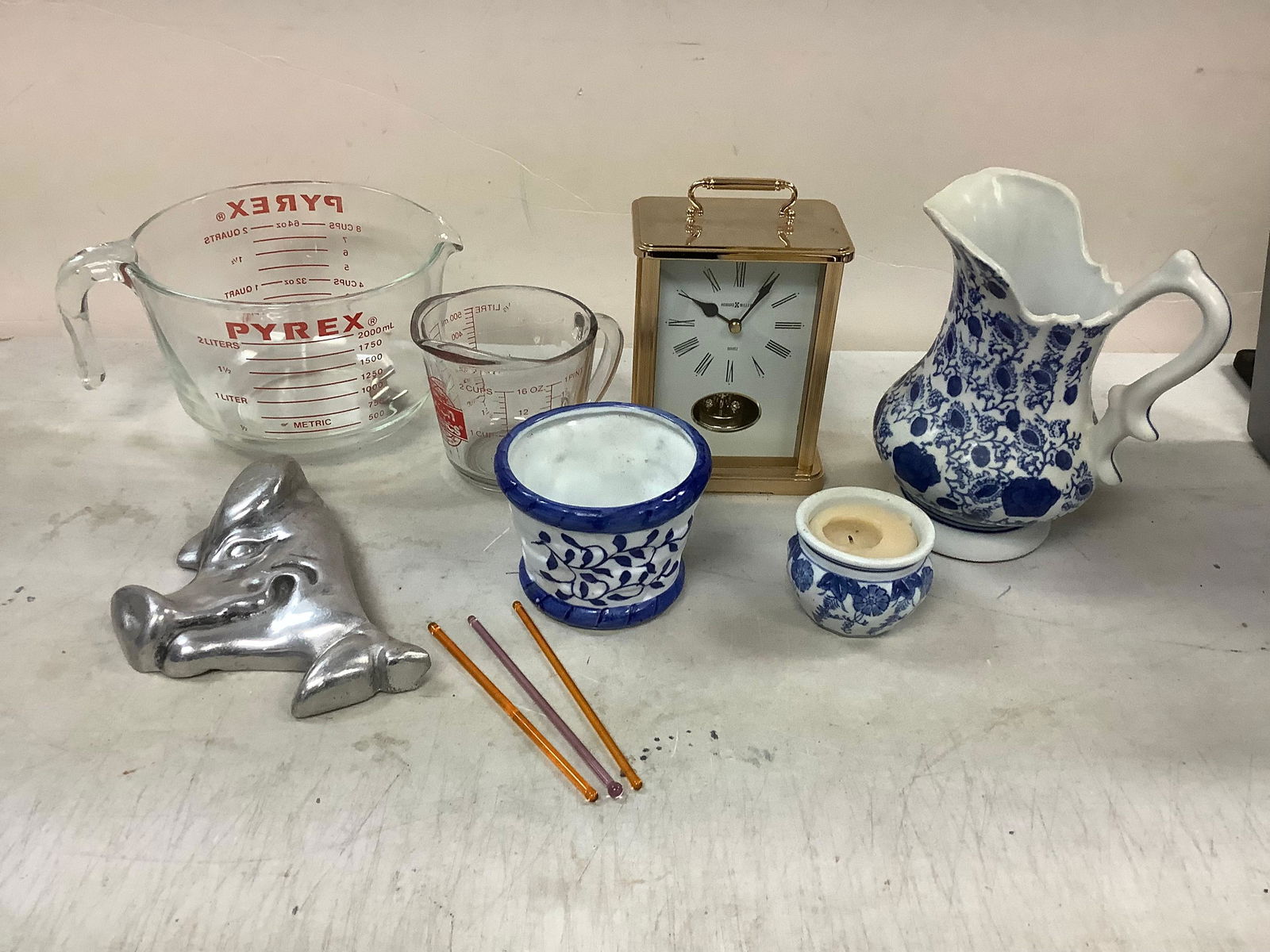 Lot of PYREX and more measuring cups, ceramic pitcher 8in tall, candle holder, clock and more (1 of 1)
