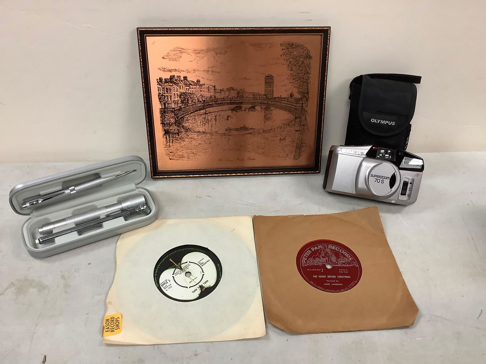 Lot of promotional and other 45's, olympus SUPERZOOM 70S camera, AAA pen, flashlight and tire tool (1 of 1)